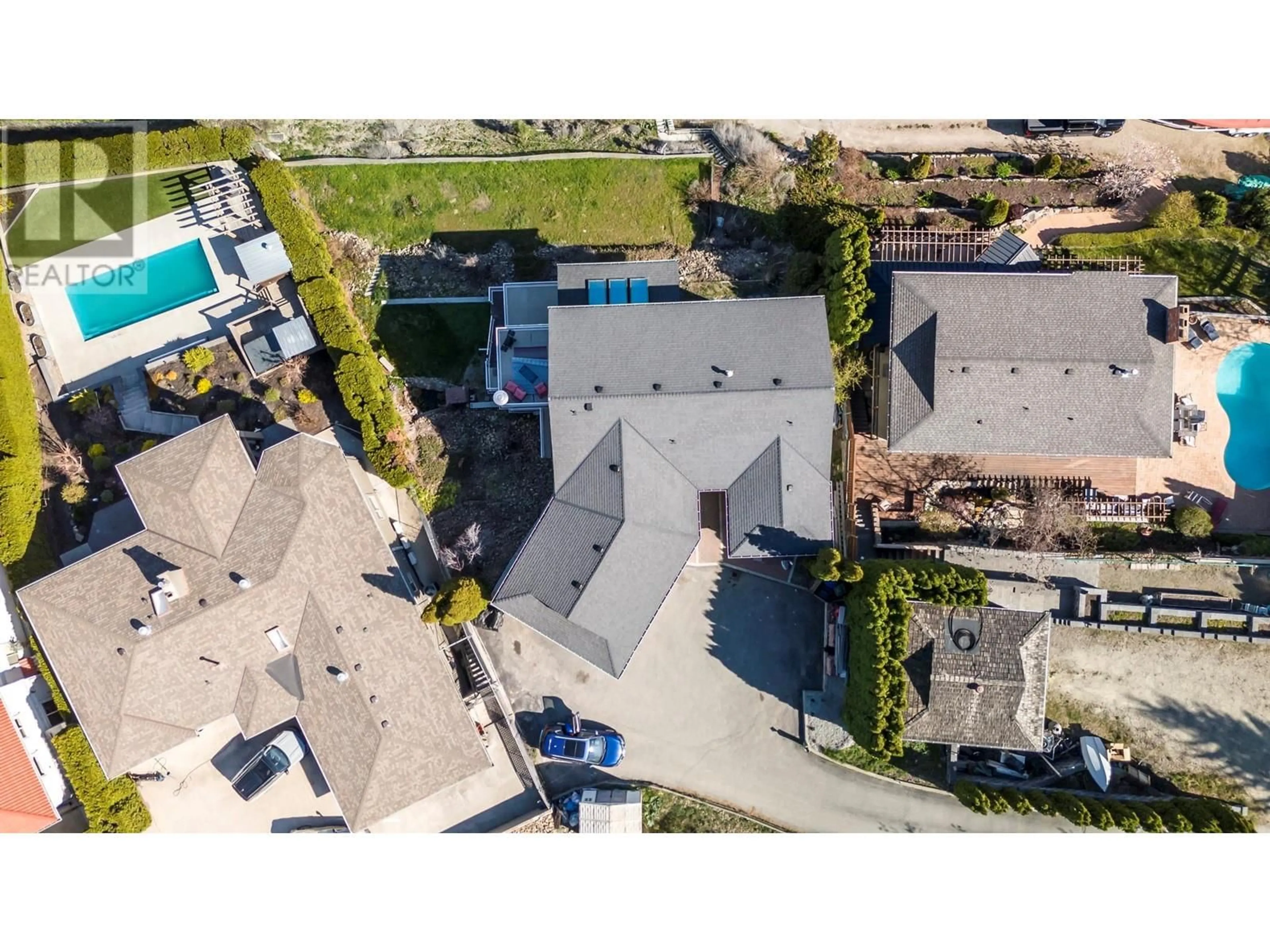 A pic from outside/outdoor area/front of a property/back of a property/a pic from drone, street for 1108 MENU ROAD, West Kelowna British Columbia V1Z2J5
