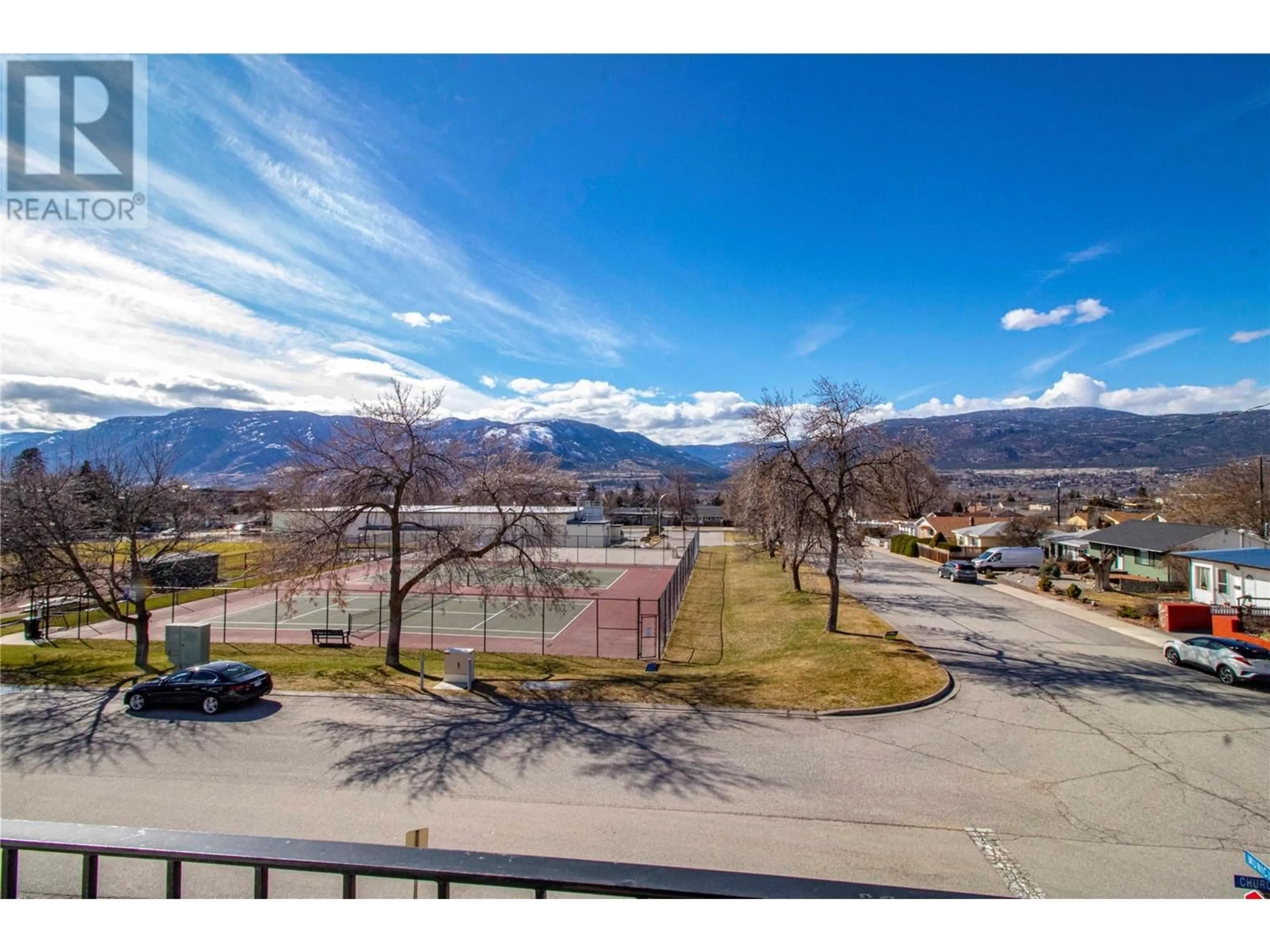 A pic from outside/outdoor area/front of a property/back of a property/a pic from drone, mountain view for 301 - 1300 CHURCH STREET, Penticton British Columbia V2A4R8