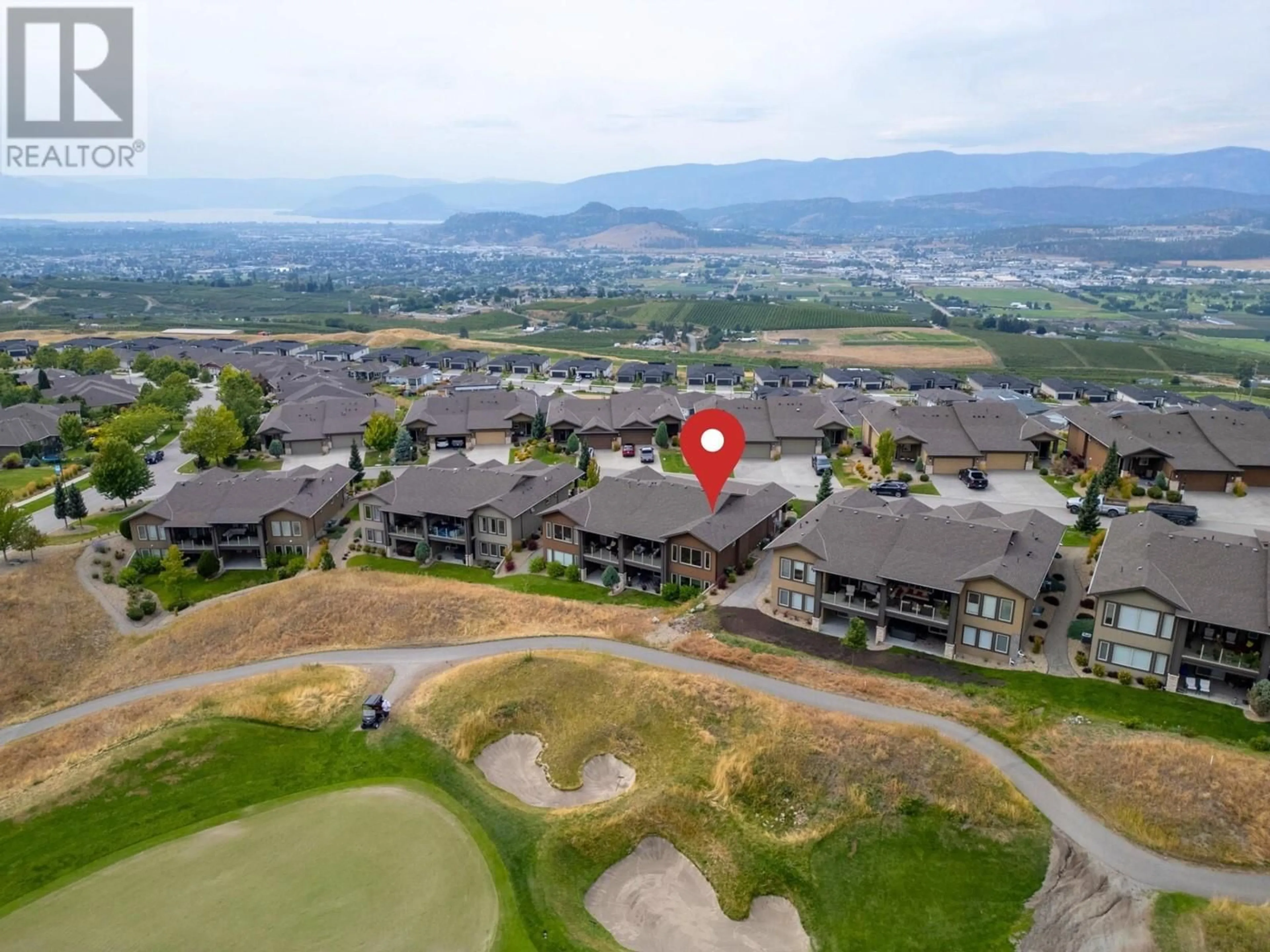 A pic from outside/outdoor area/front of a property/back of a property/a pic from drone, mountain view for 37 - 1836 TOWER RANCH BOULEVARD, Kelowna British Columbia V1P1S8