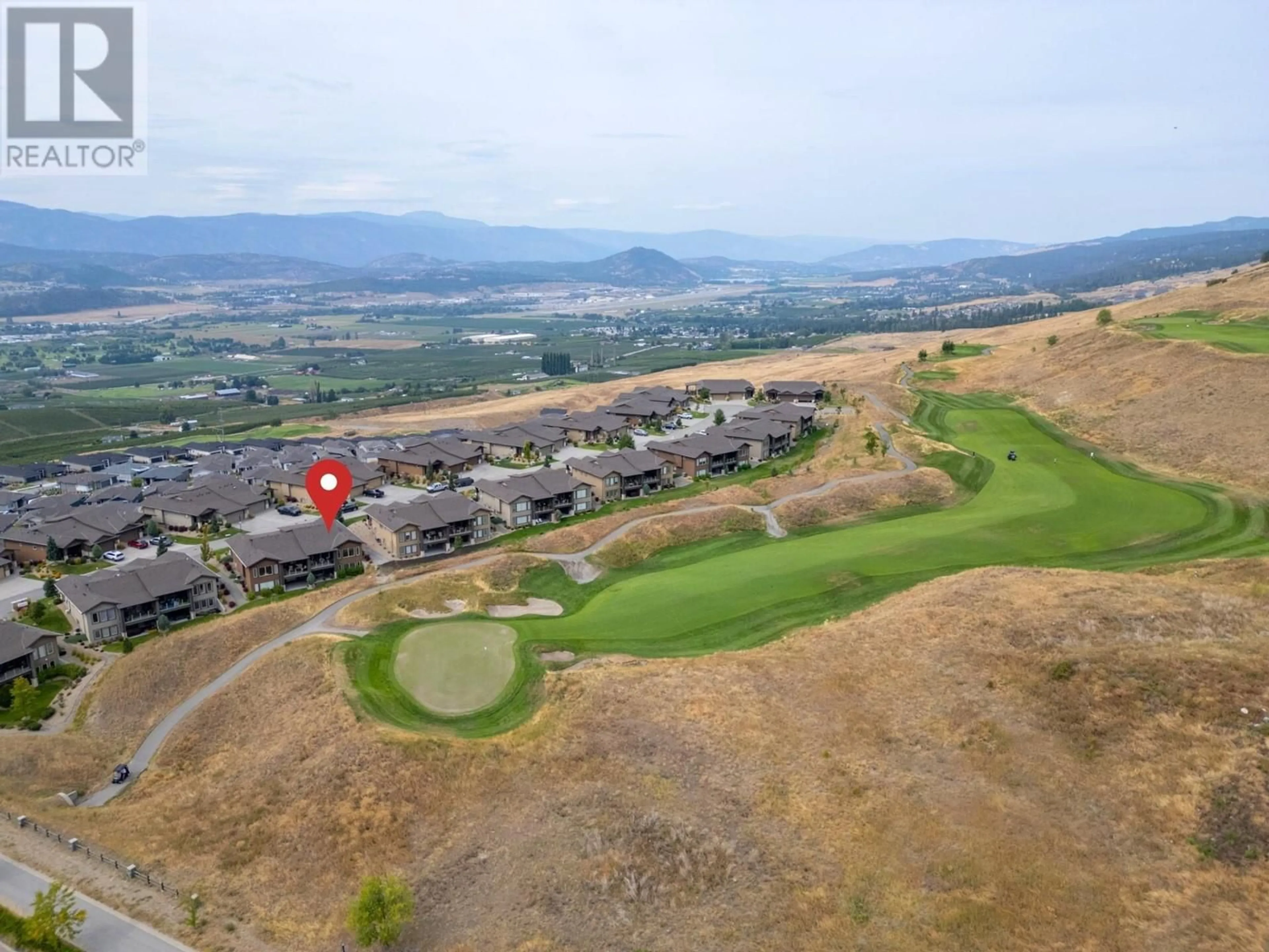 A pic from outside/outdoor area/front of a property/back of a property/a pic from drone, mountain view for 37 - 1836 TOWER RANCH BOULEVARD, Kelowna British Columbia V1P1S8