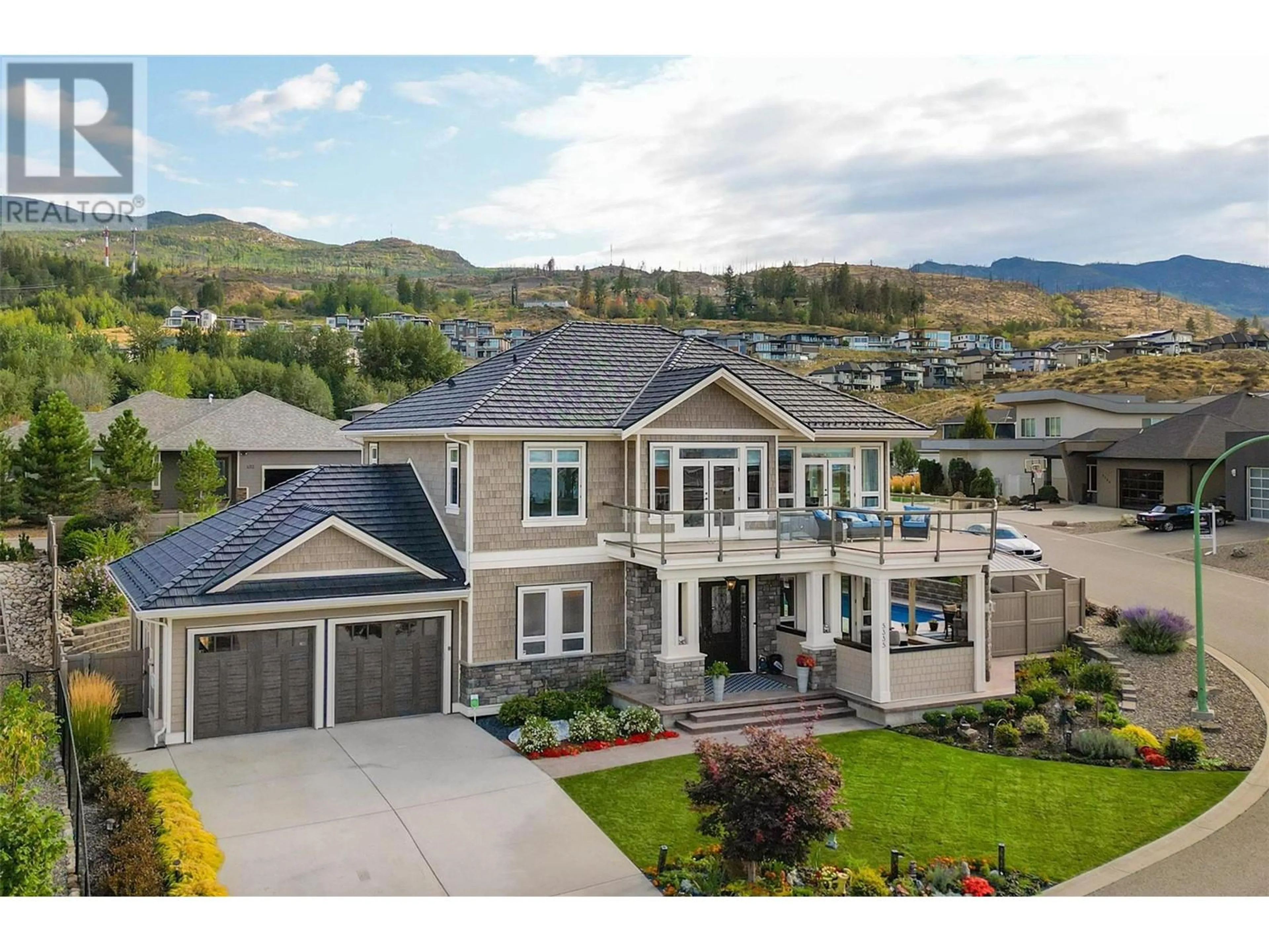 Home with vinyl exterior material, mountain view for 5335 Signet Crescent, Kelowna British Columbia V1W5J5