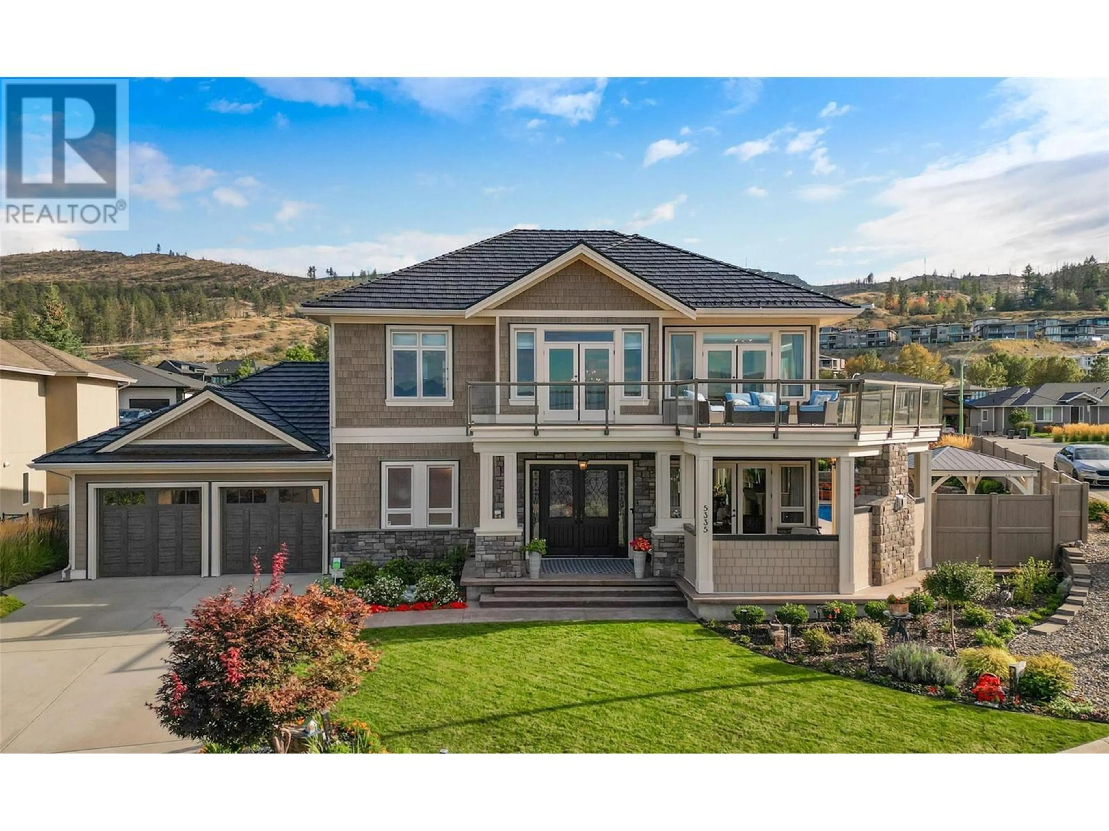 Home with vinyl exterior material, mountain view for 5335 Signet Crescent, Kelowna British Columbia V1W5J5