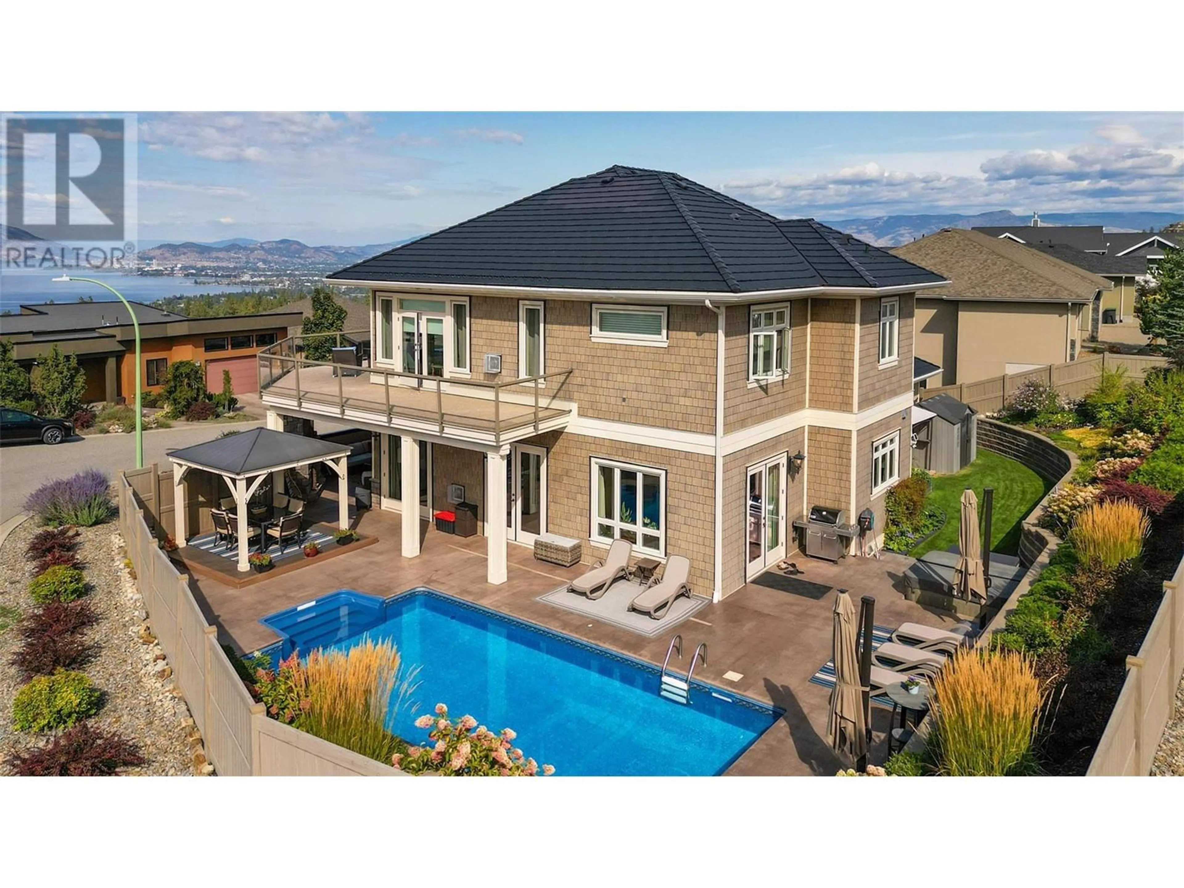 A pic from outside/outdoor area/front of a property/back of a property/a pic from drone, unknown for 5335 Signet Crescent, Kelowna British Columbia V1W5J5