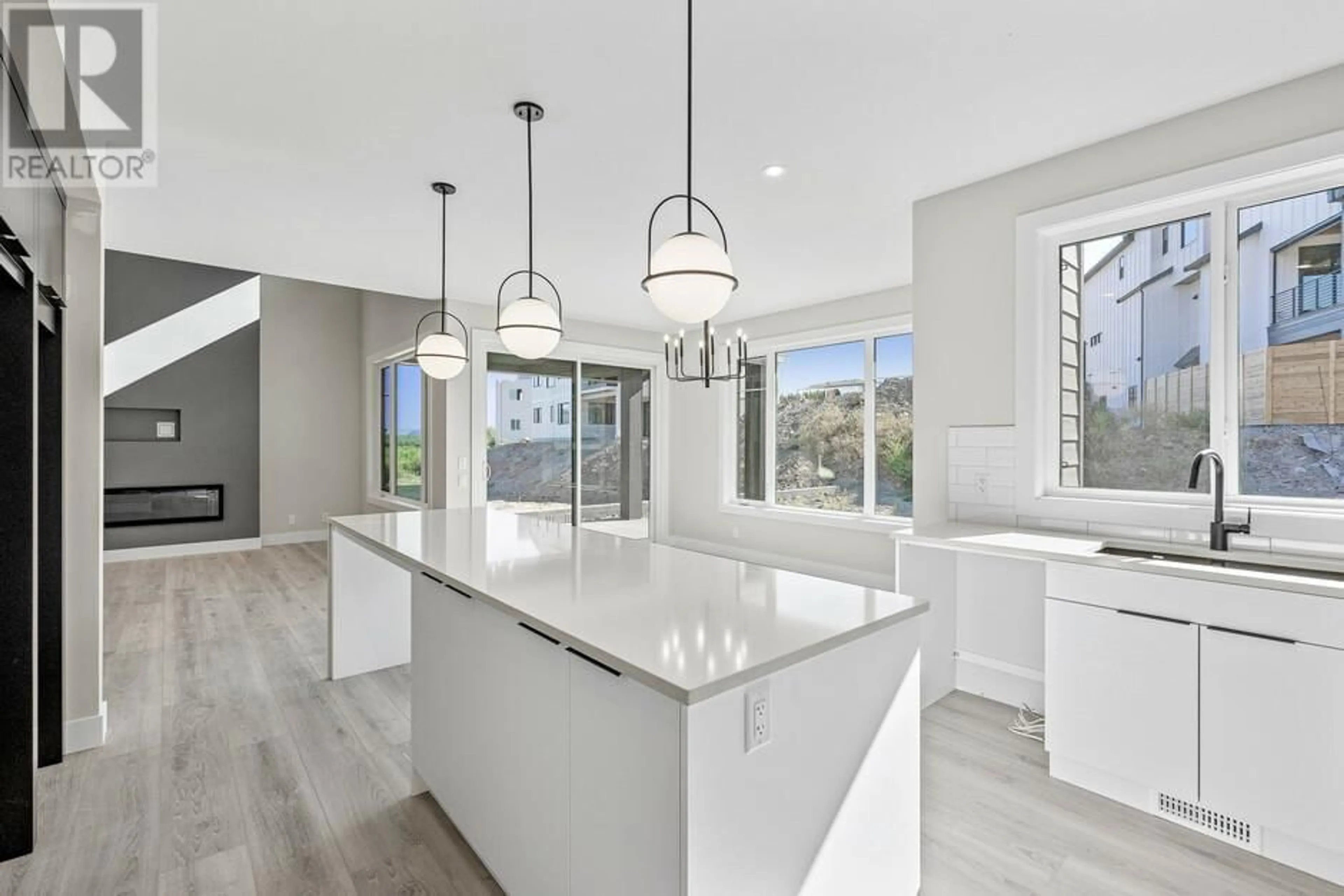 Open concept kitchen, ceramic/tile floor for 4267 RUSSO STREET, Kelowna British Columbia V1W0C6