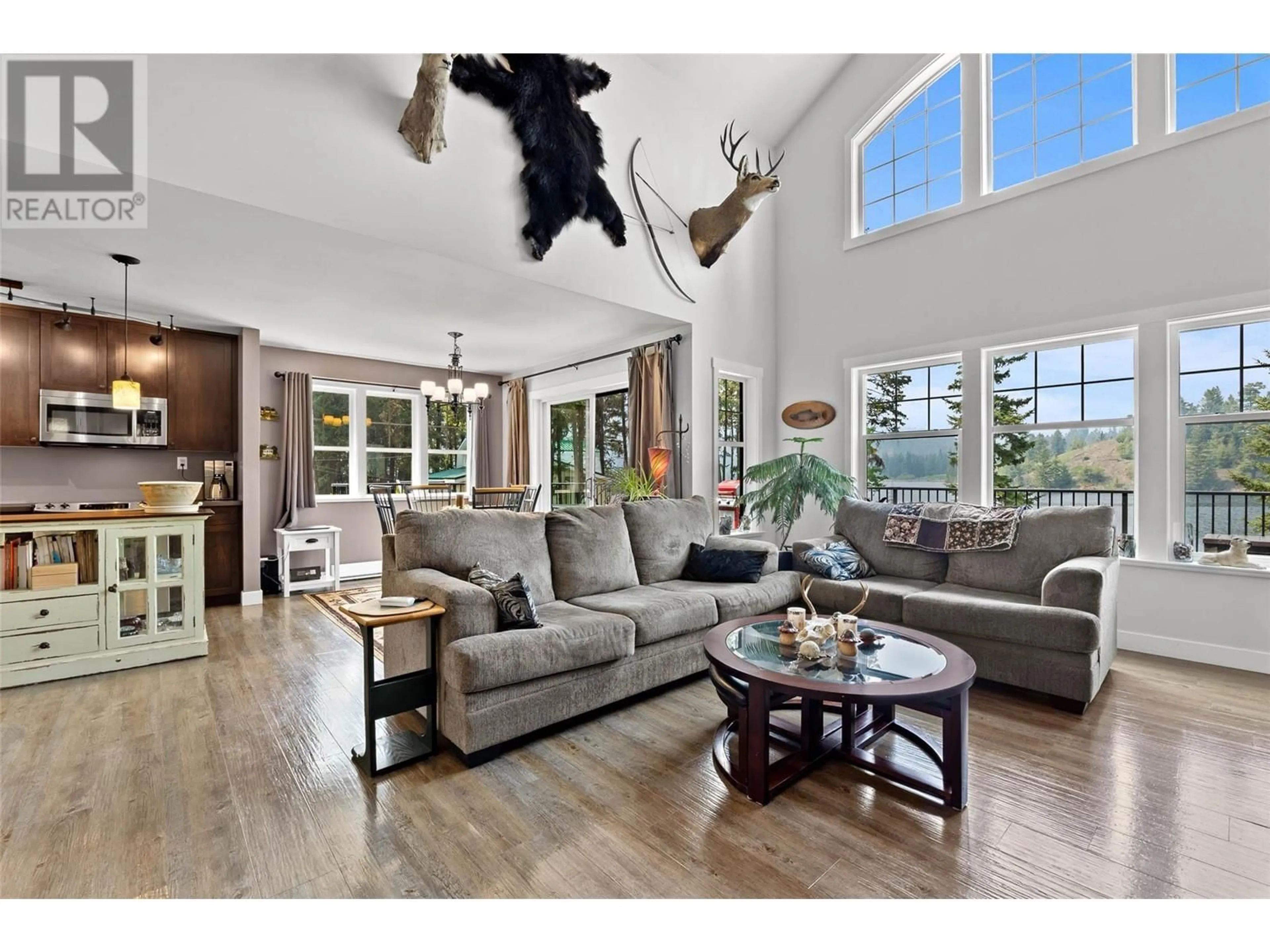 Living room with furniture, wood/laminate floor for 3461 RED LAKE DRIVE, Kamloops British Columbia V0K2J0