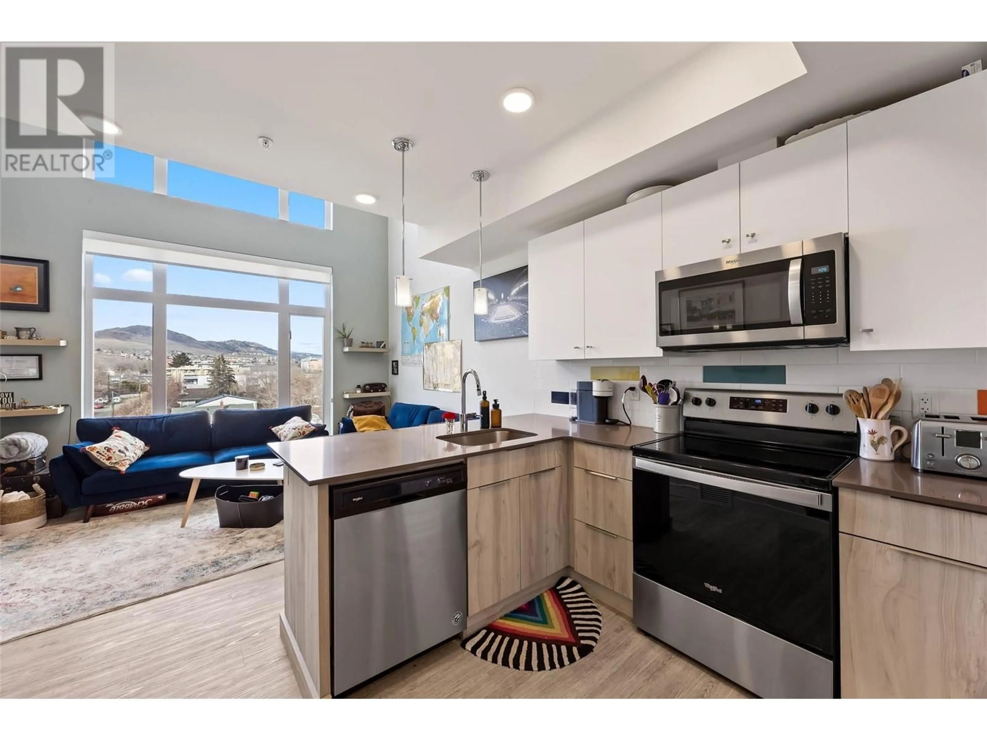 Open concept kitchen, ceramic/tile floor for 402 - 107 YEW STREET, Kamloops British Columbia V2B3Z9