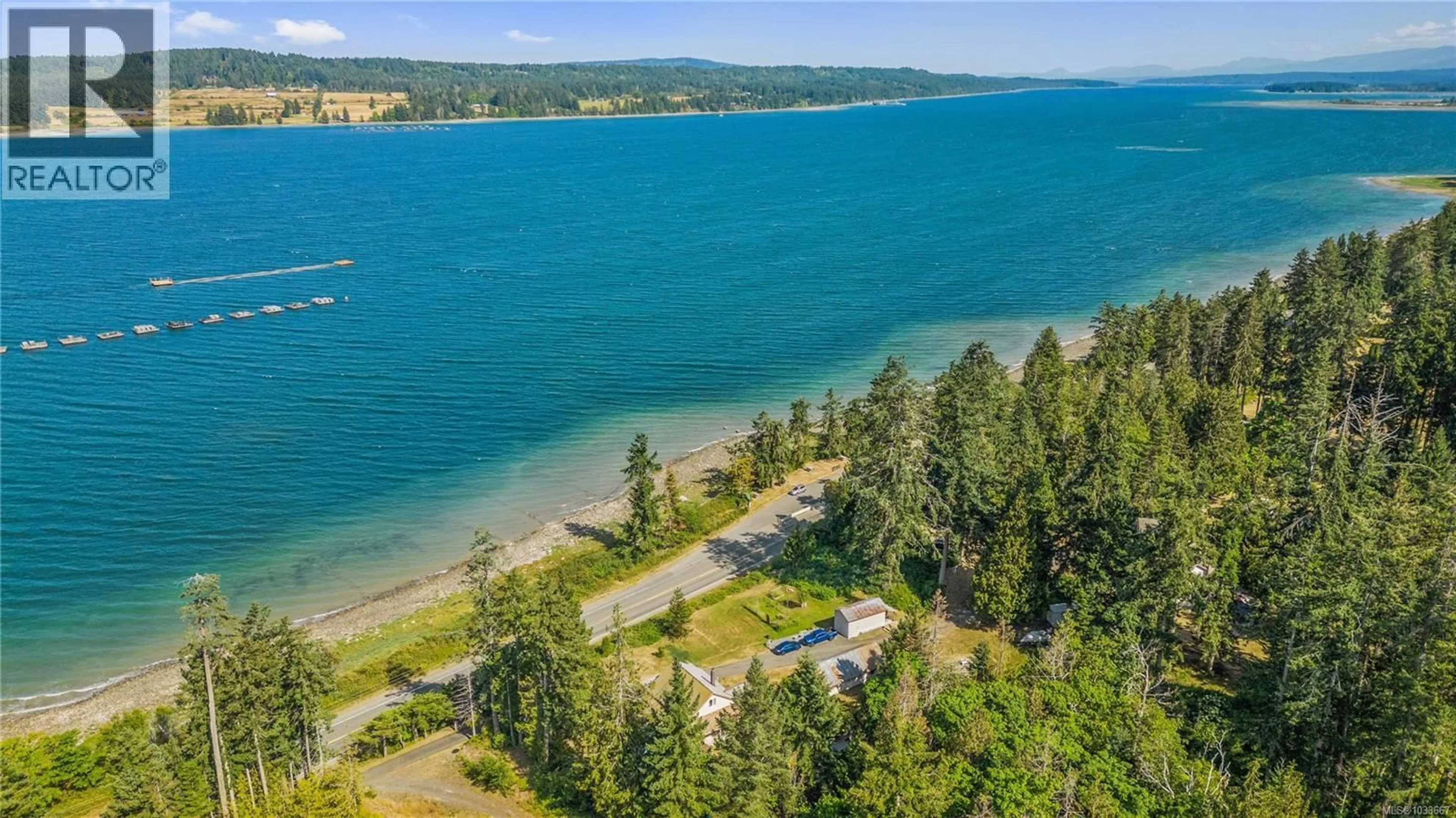 A pic from outside/outdoor area/front of a property/back of a property/a pic from drone, water/lake/river/ocean view for 6249/6259 ISLAND HIGHWAY SOUTH, Union Bay British Columbia V0R3B0