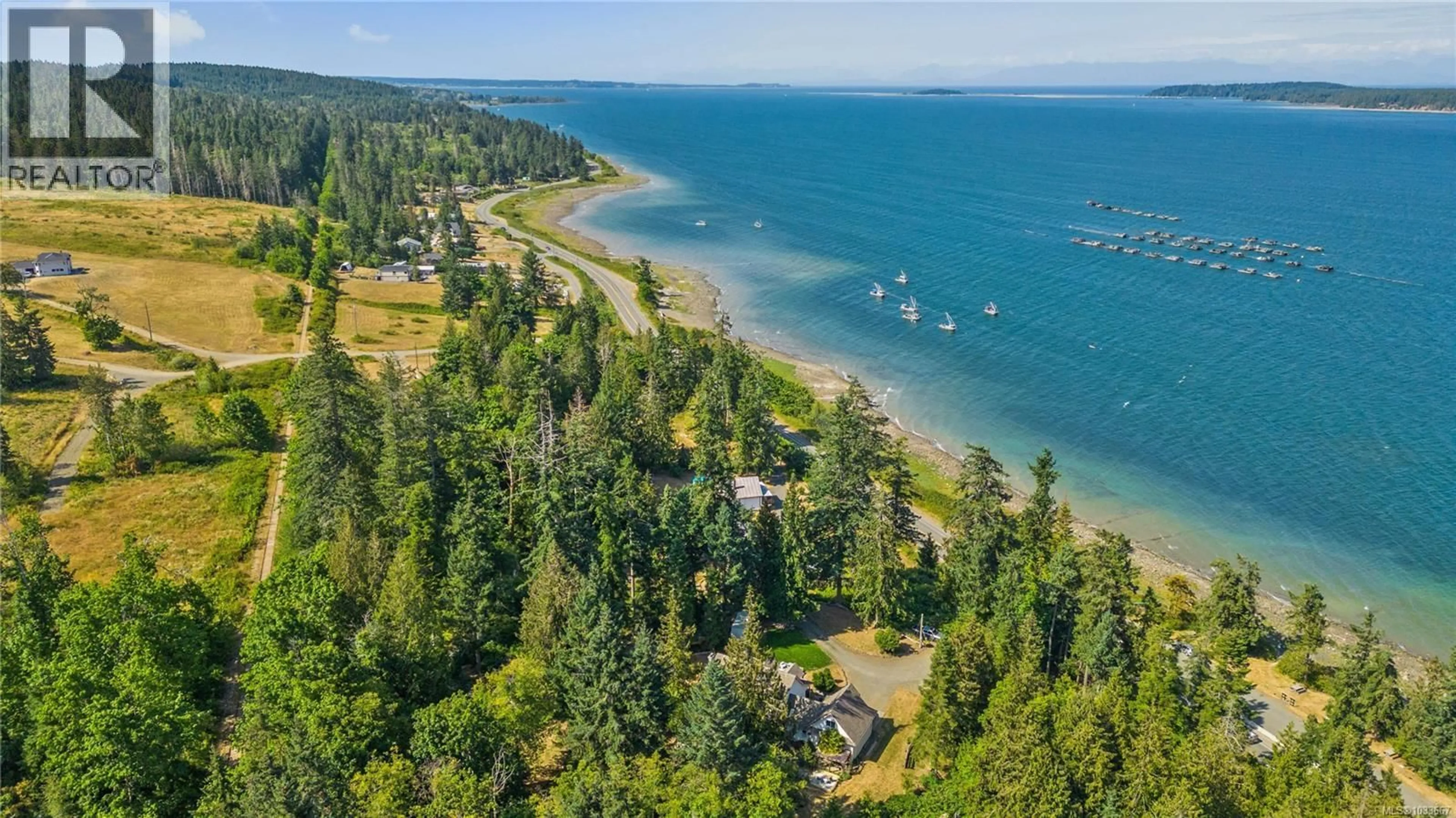 A pic from outside/outdoor area/front of a property/back of a property/a pic from drone, water/lake/river/ocean view for 6249/6259 ISLAND HIGHWAY SOUTH, Union Bay British Columbia V0R3B0