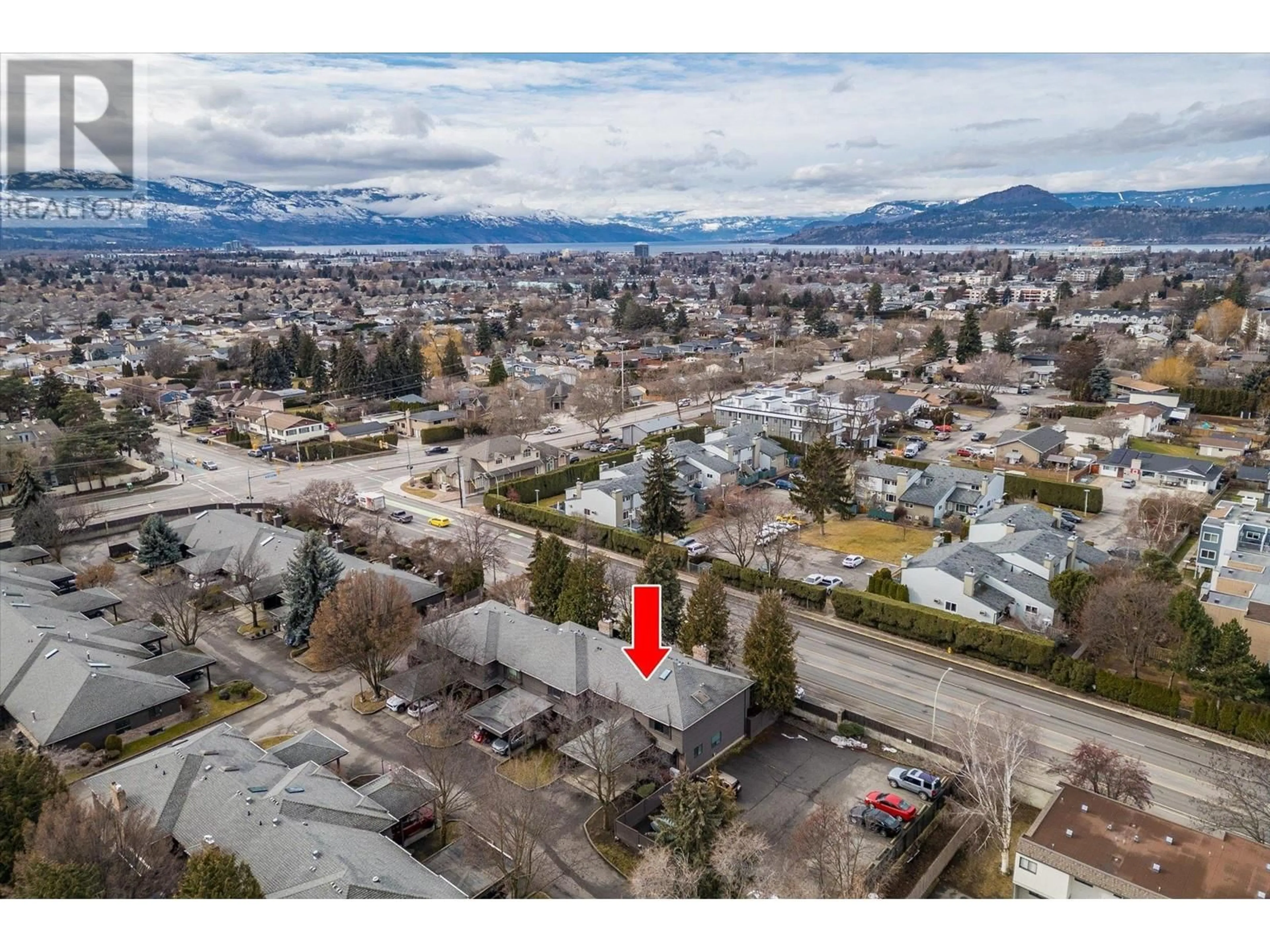 A pic from outside/outdoor area/front of a property/back of a property/a pic from drone, mountain view for 1995 Burtch Road Unit# 108, Kelowna British Columbia V1Y4B4