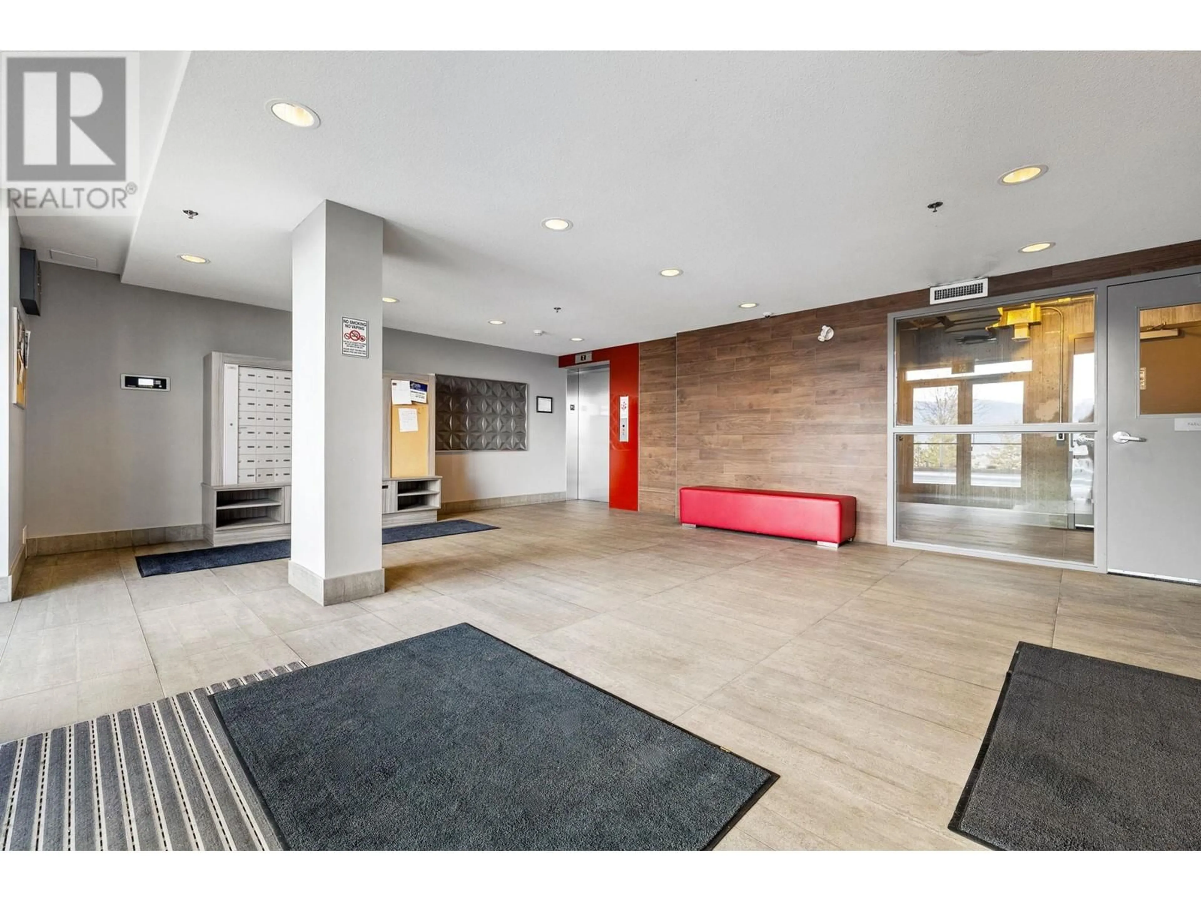 Indoor foyer for 883 Academy Way Unit# 312, Kelowna British Columbia V5K3K4