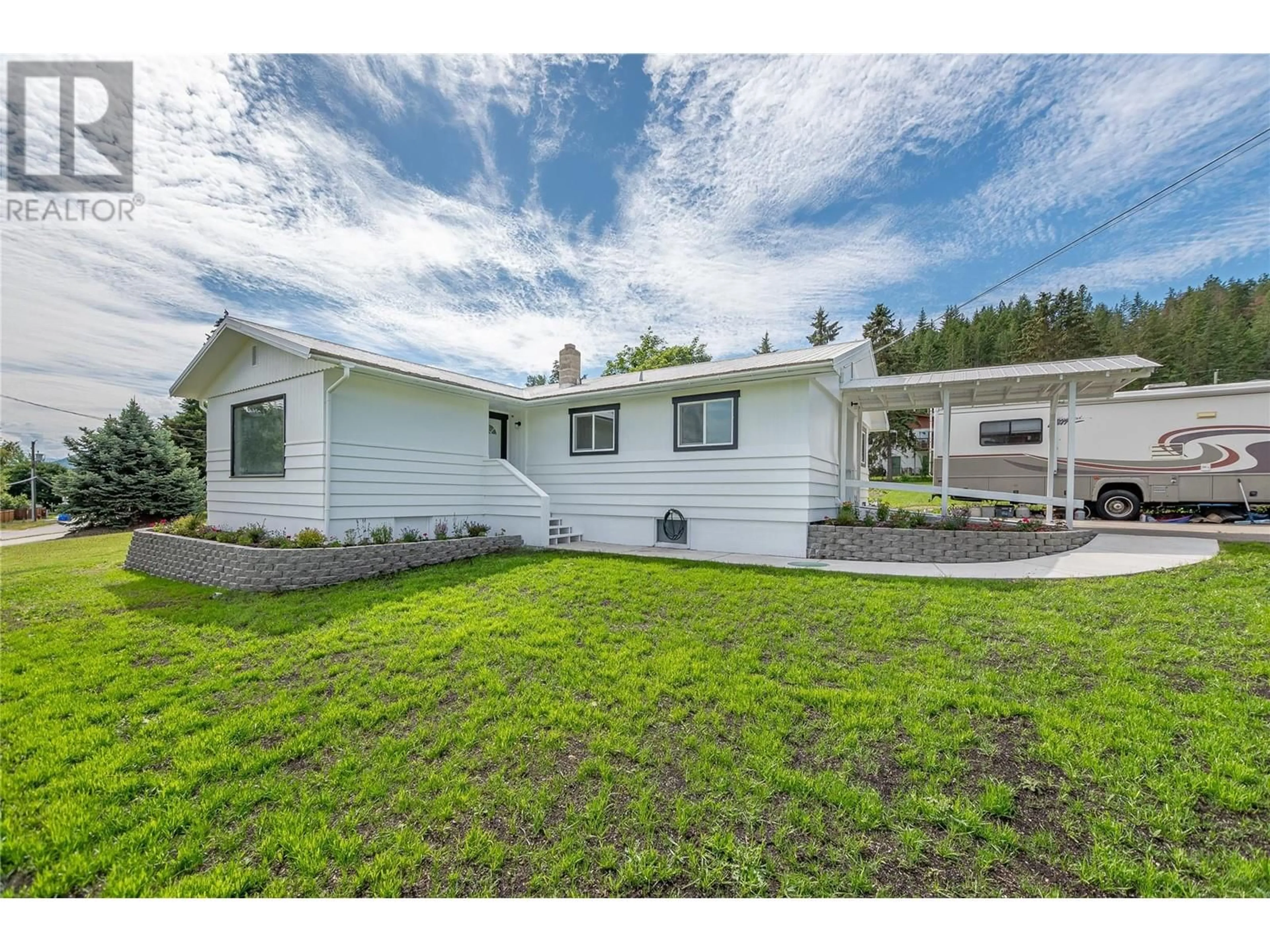 Home with vinyl exterior material, street for 174 SALMON ARM DRIVE, Enderby British Columbia V0E1V1