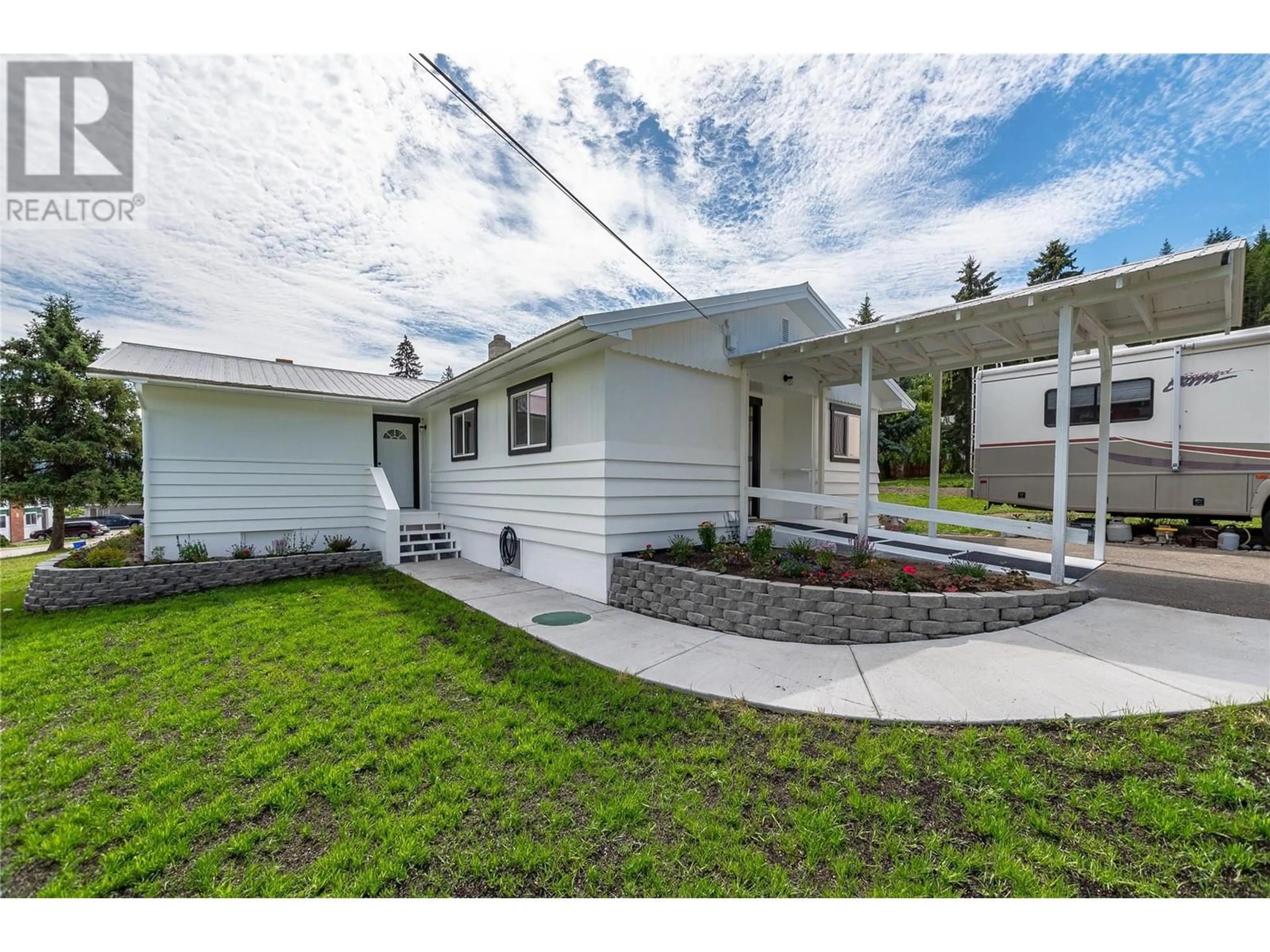 Home with vinyl exterior material, street for 174 SALMON ARM DRIVE, Enderby British Columbia V0E1V1