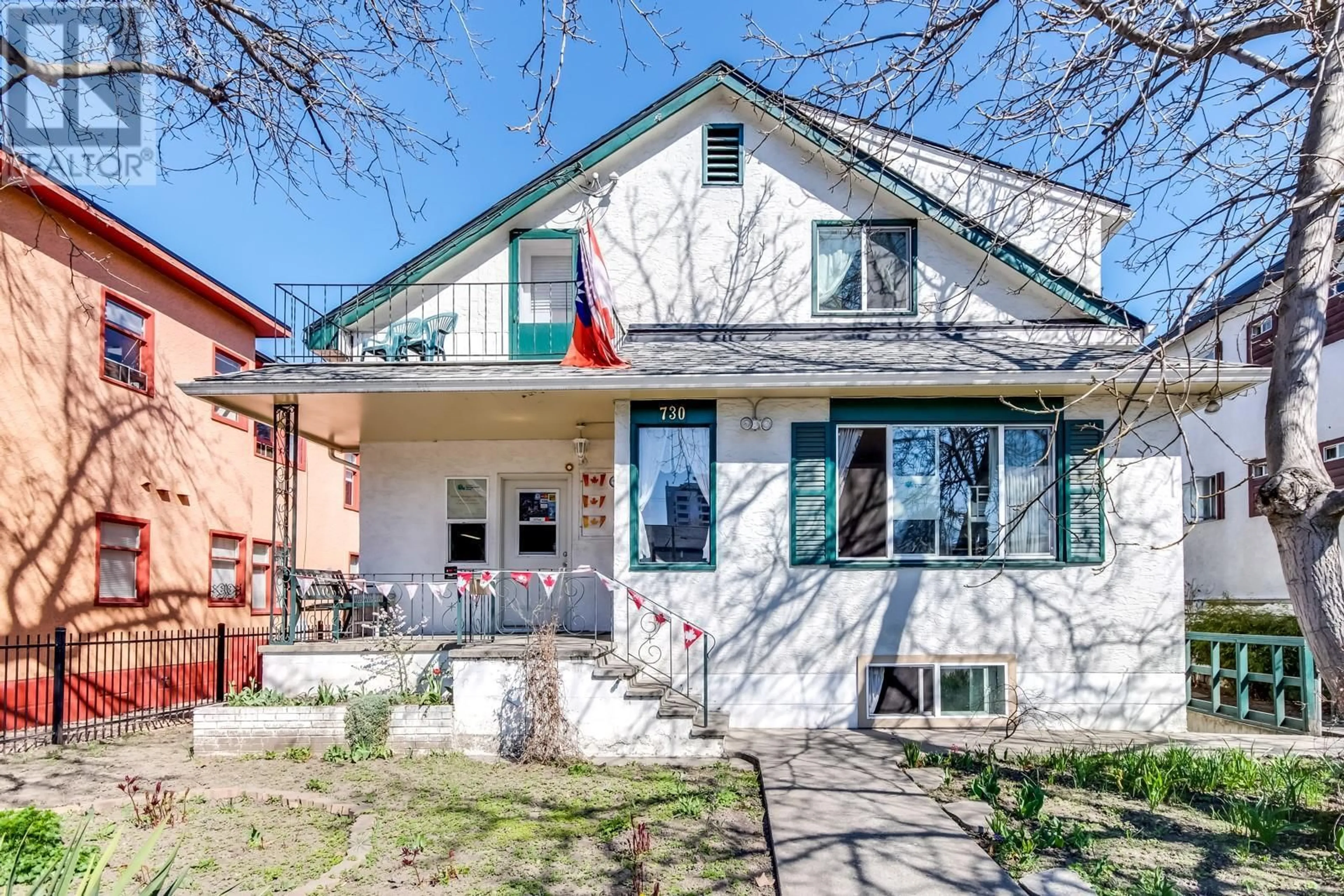 Home with brick exterior material, street for 730 BERNARD AVENUE, Kelowna British Columbia V1Y6P5