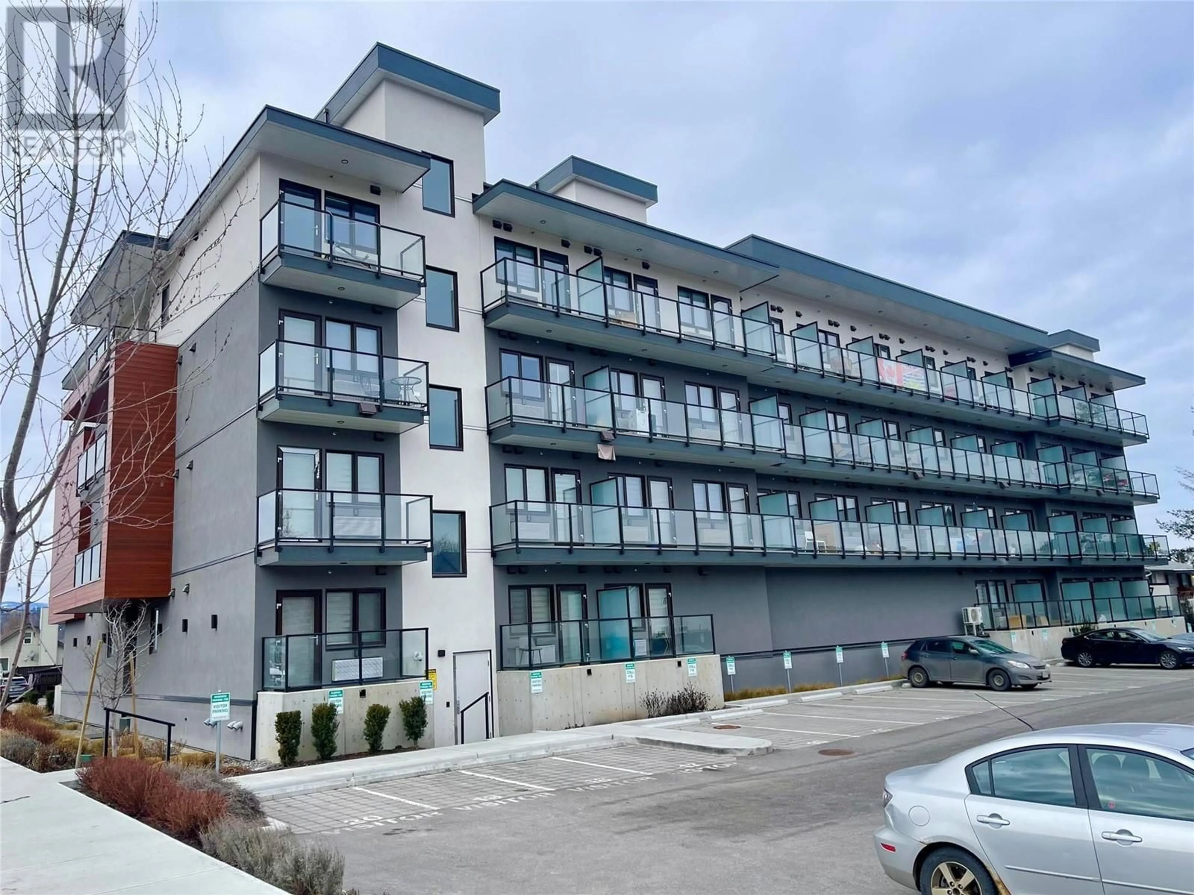 A pic from outside/outdoor area/front of a property/back of a property/a pic from drone, building for 202 - 345 DOUGALL ROAD NORTH, Kelowna British Columbia V1X3K8