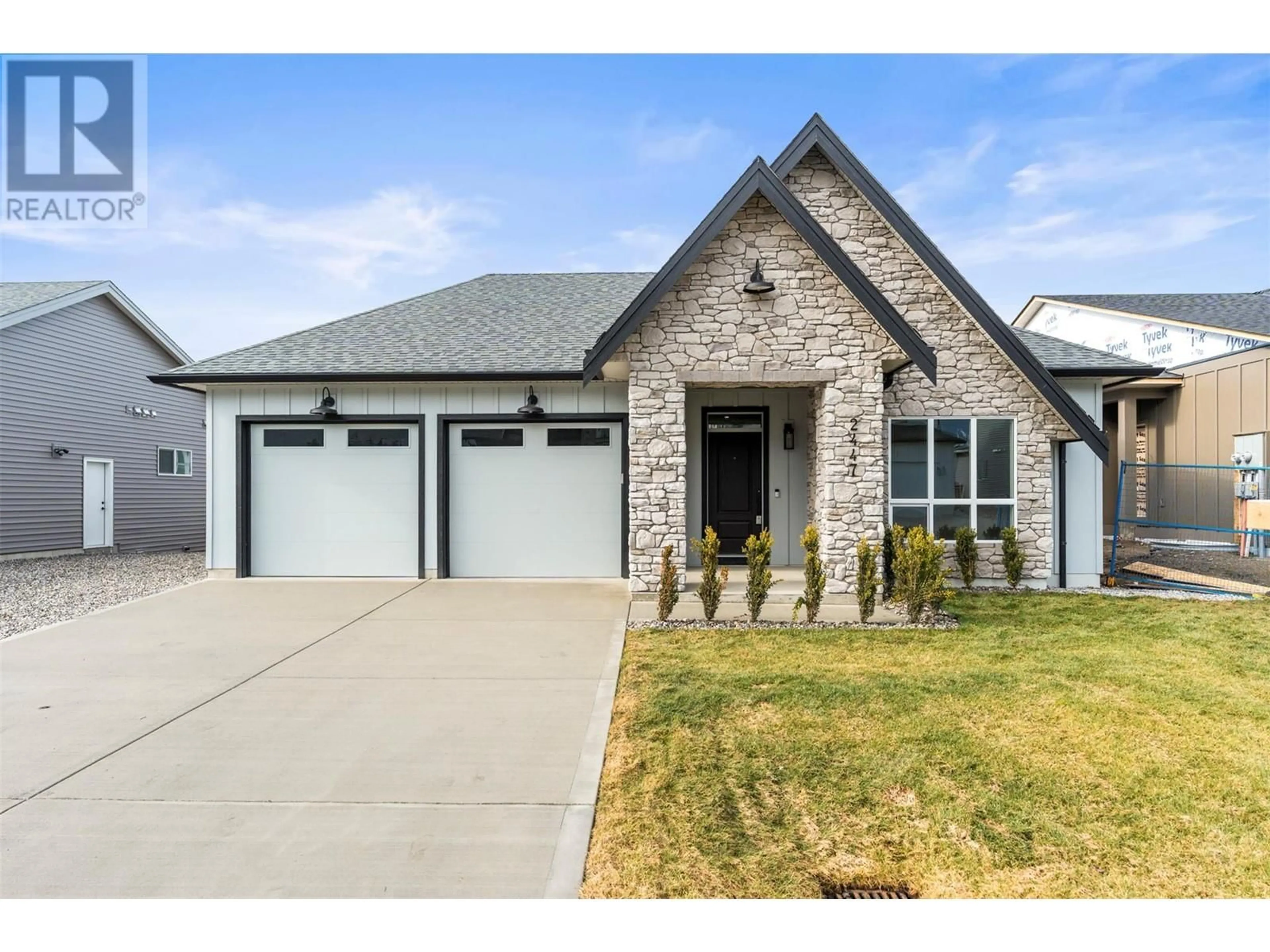 Home with brick exterior material, street for 2447 BRADLEY DRIVE, Armstrong British Columbia V4Y0Y4