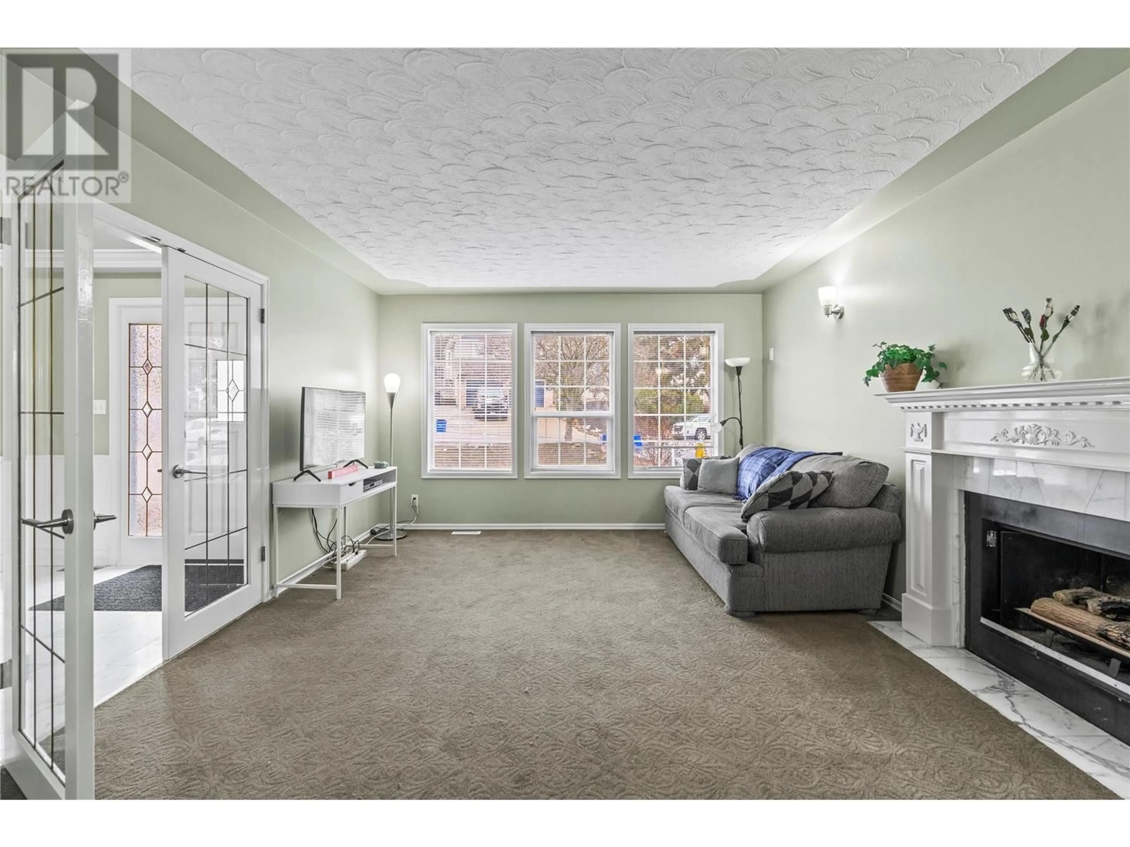 Living room with furniture, unknown for 4404 WELLINGTON DRIVE, Vernon British Columbia V1T8W3