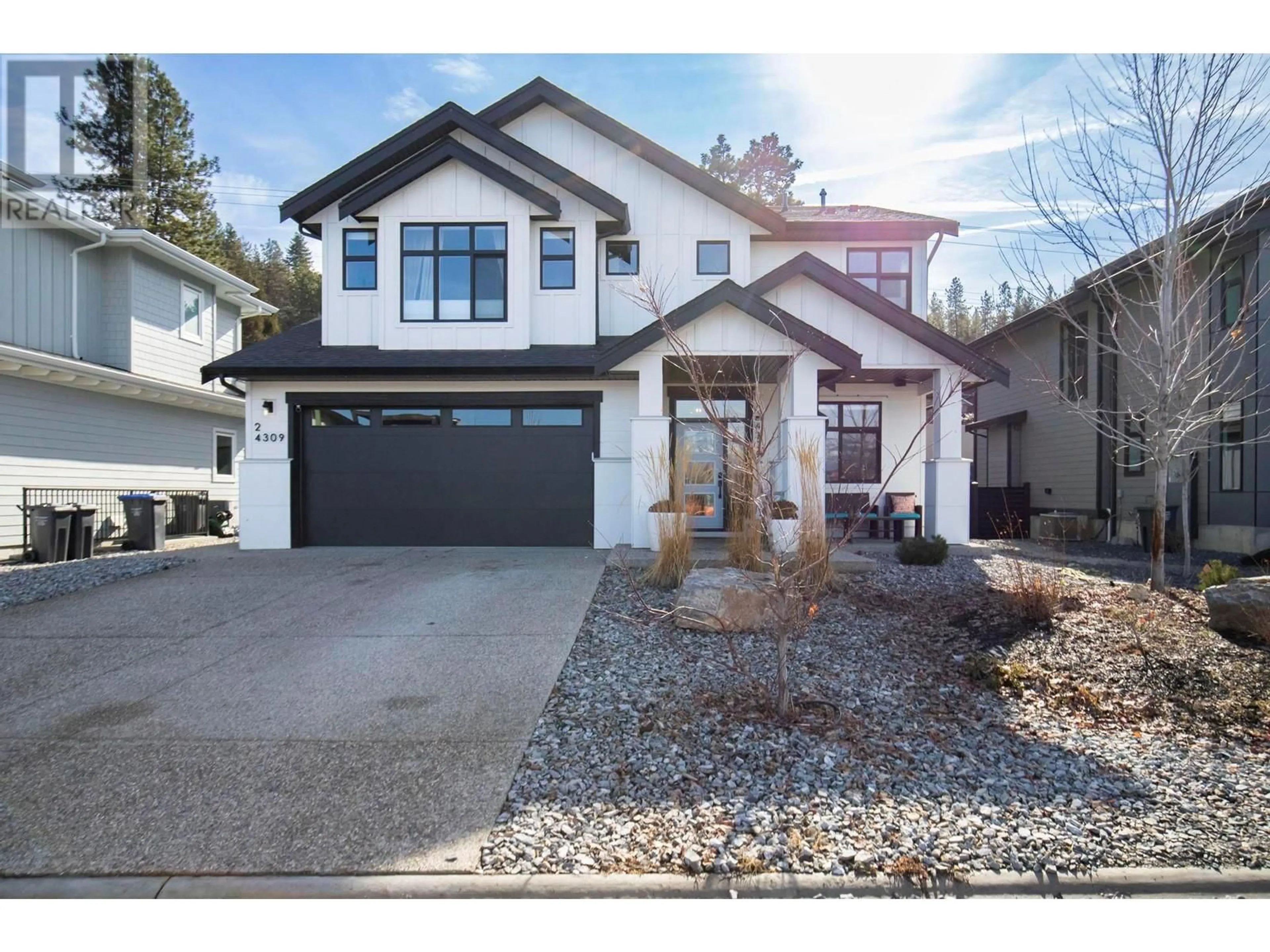 Home with brick exterior material, street for 4309 Ladd Court, Kelowna British Columbia V1W0B6