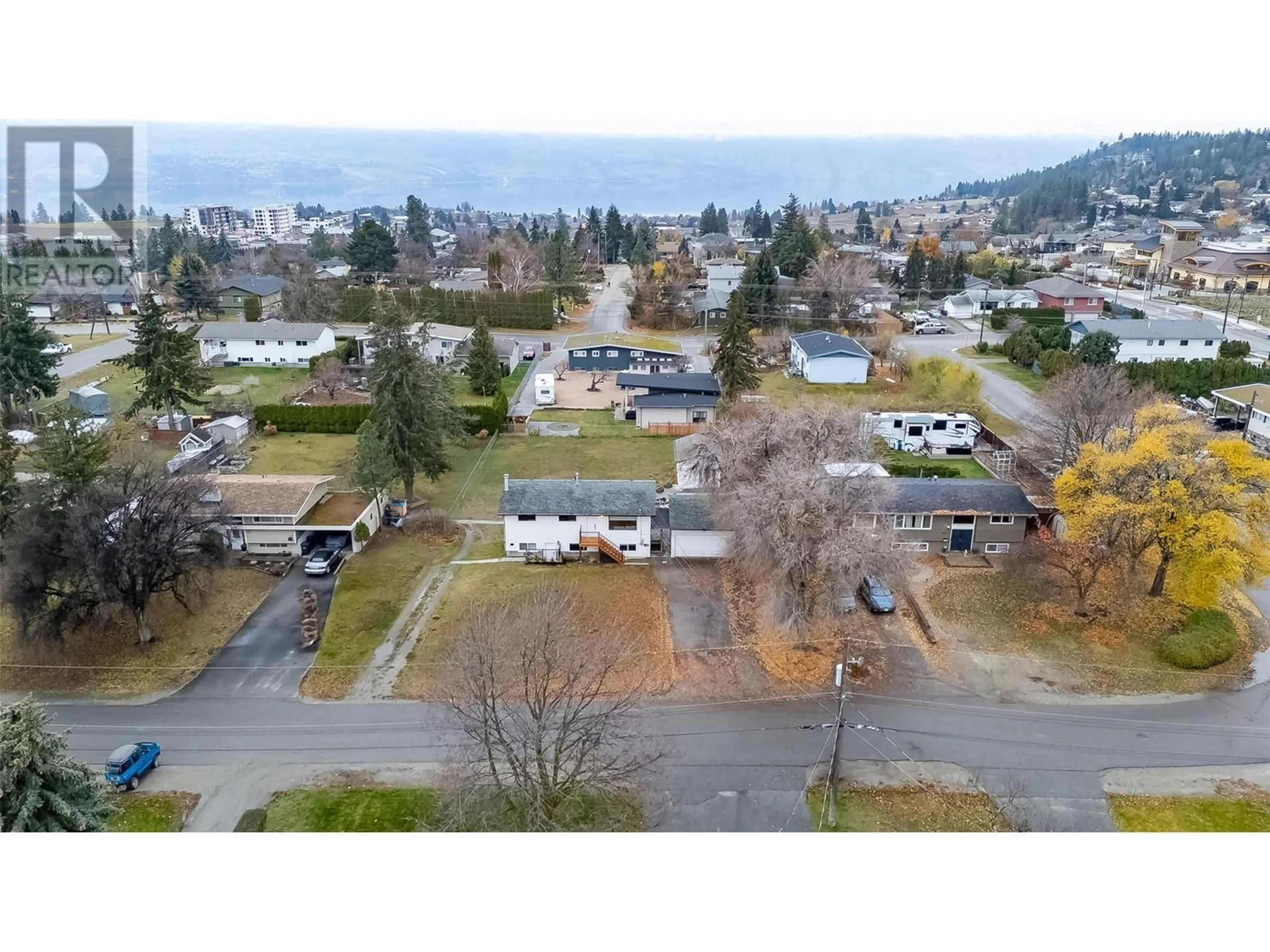 A pic from outside/outdoor area/front of a property/back of a property/a pic from drone, mountain view for 935 McKay Road, West Kelowna British Columbia V1Z2C5