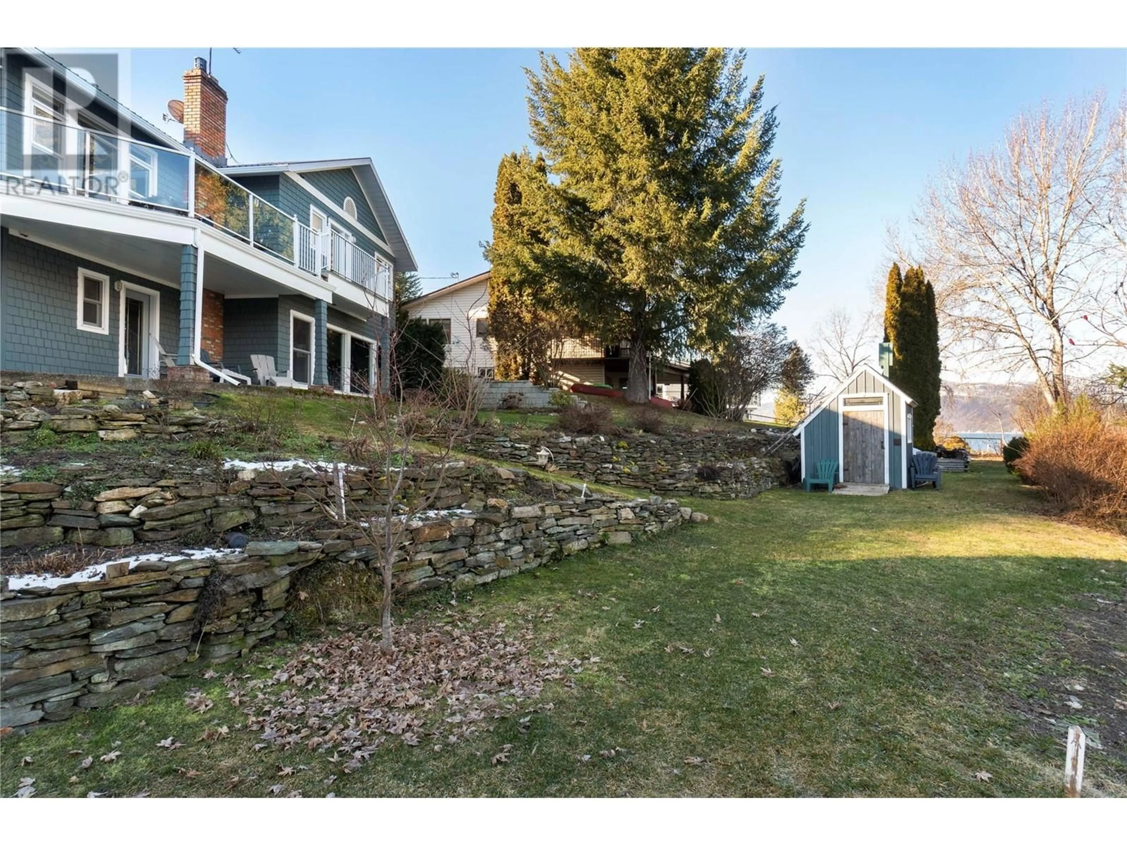 A pic from outside/outdoor area/front of a property/back of a property/a pic from drone, street for 3533 EAGLE BAY ROAD, Blind Bay British Columbia V0E1H1