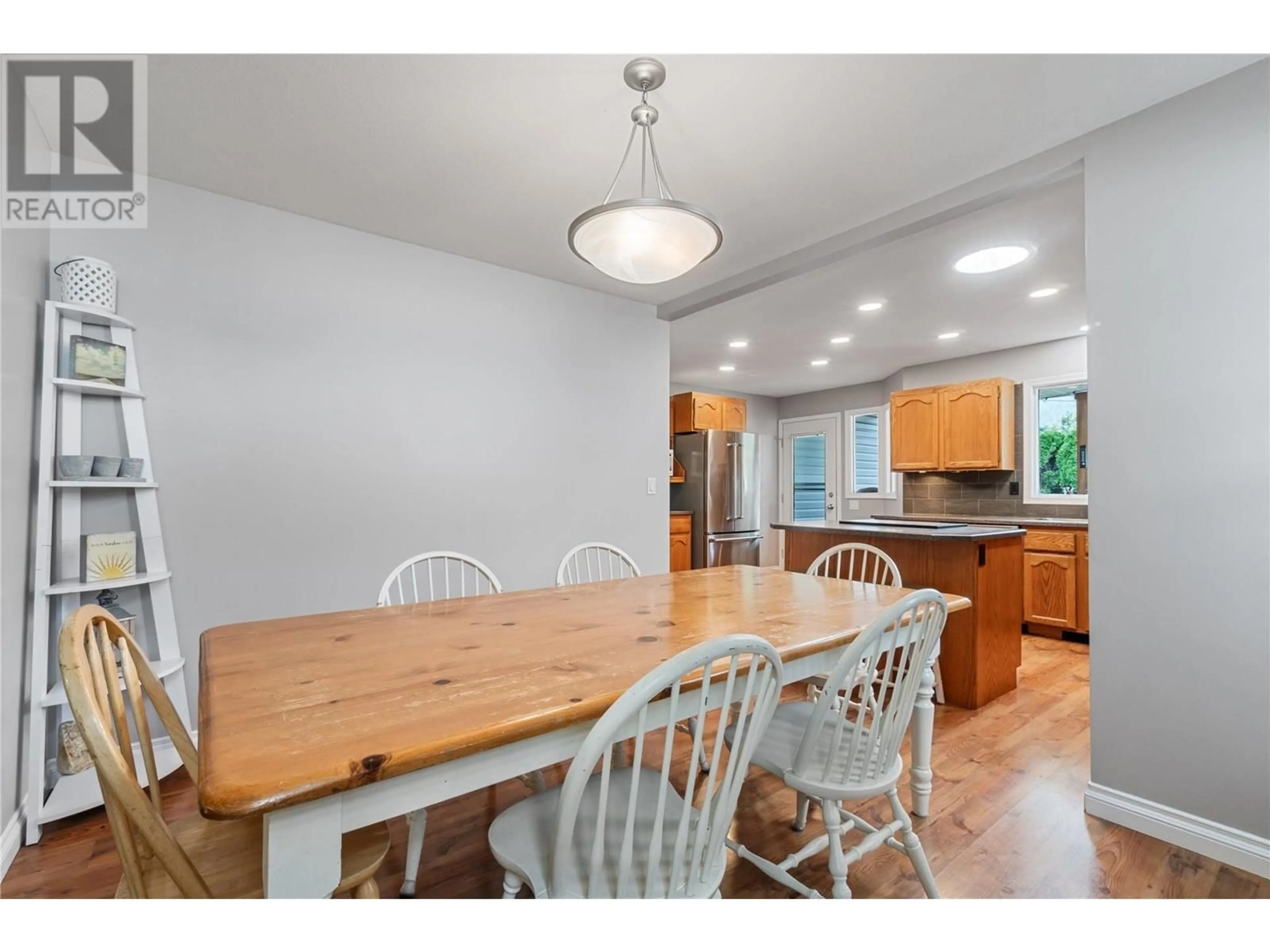 Dining room, wood/laminate floor for 284 Drysdale Boulevard, Kelowna British Columbia V1V1P5