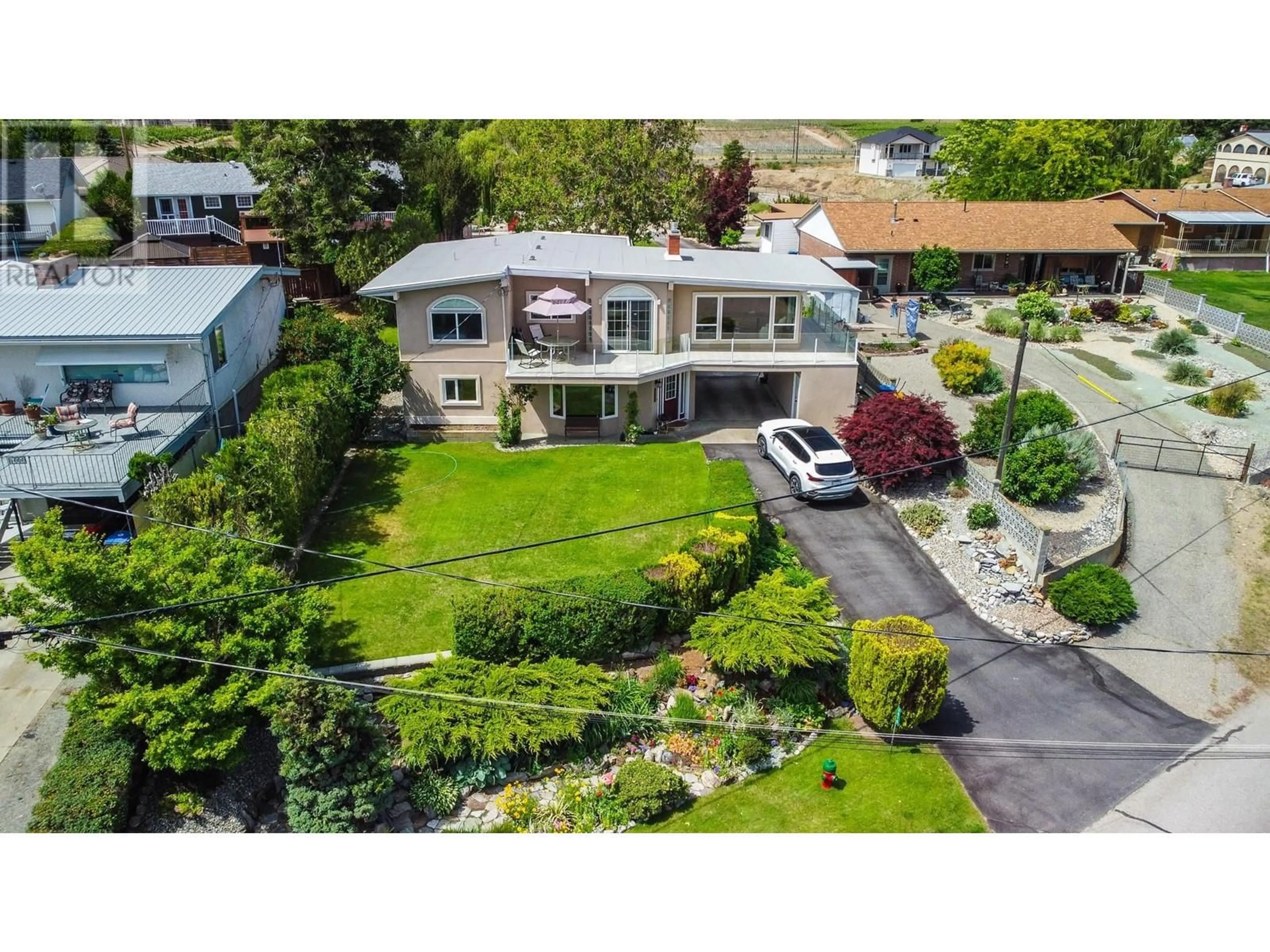 A pic from outside/outdoor area/front of a property/back of a property/a pic from drone, street for 3610 JASMINE DRIVE, Osoyoos British Columbia V0H1V1