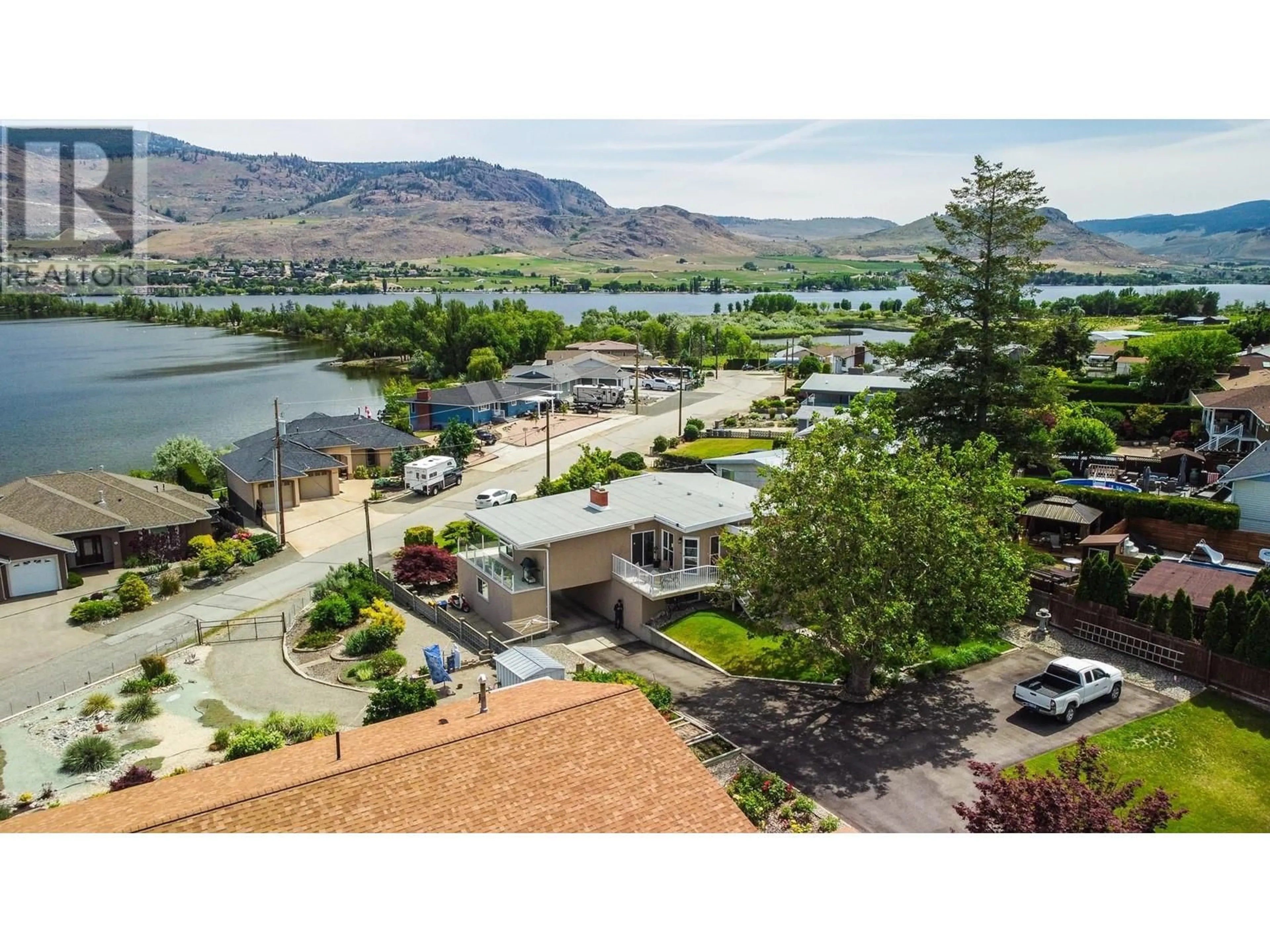 A pic from outside/outdoor area/front of a property/back of a property/a pic from drone, water/lake/river/ocean view for 3610 JASMINE DRIVE, Osoyoos British Columbia V0H1V1