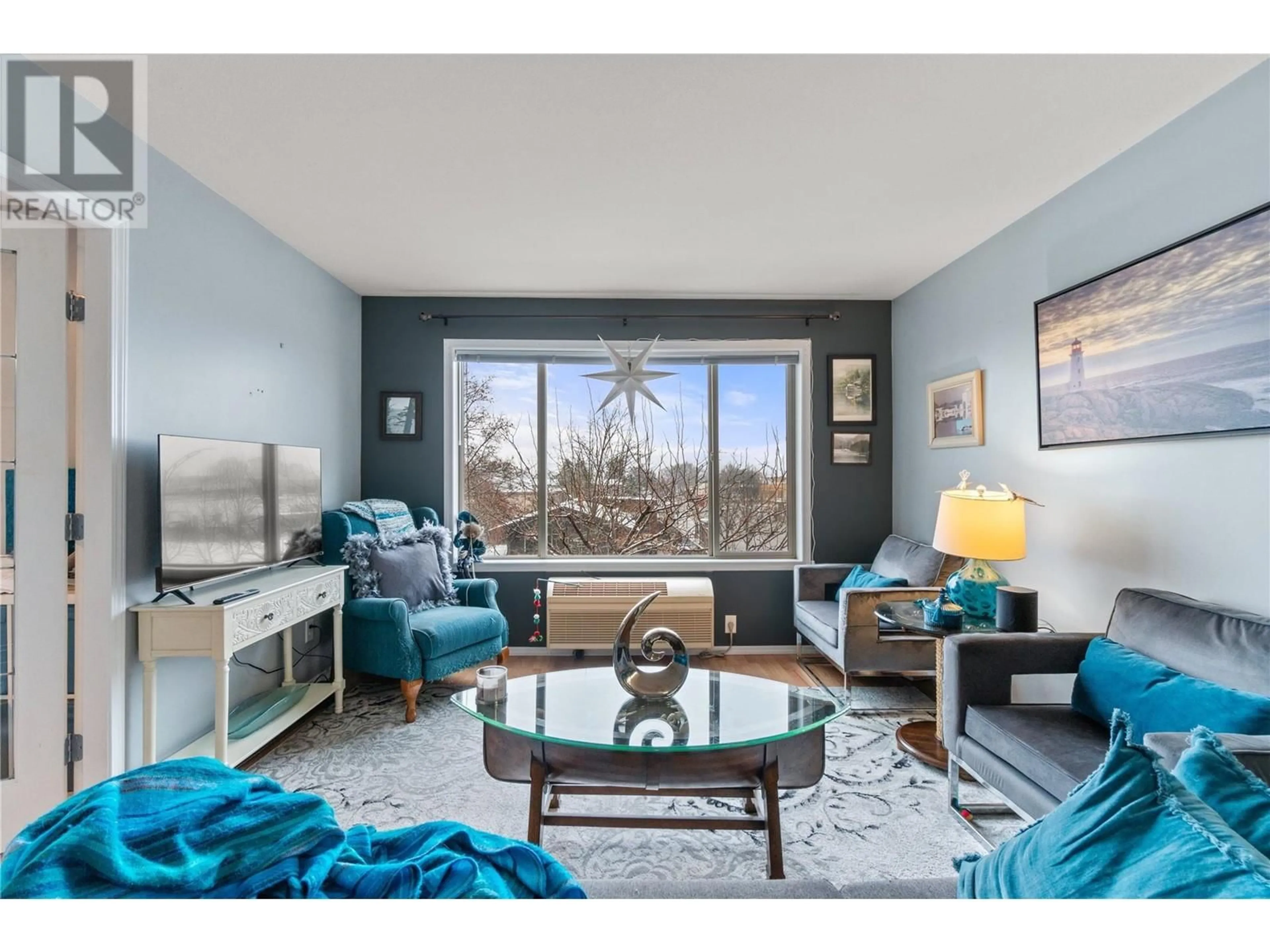 Living room with furniture, unknown for 309 - 250 DOUGALL ROAD NORTH, Kelowna British Columbia V1X3K5