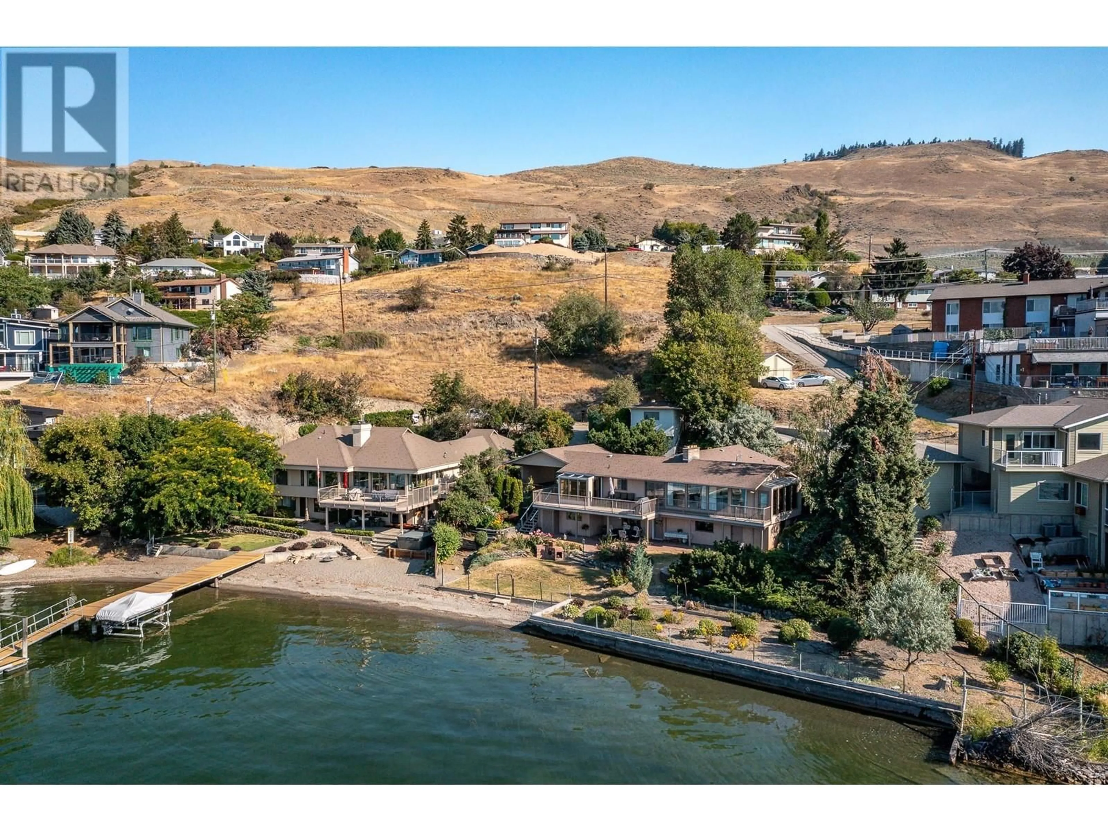 A pic from outside/outdoor area/front of a property/back of a property/a pic from drone, water/lake/river/ocean view for 7444 OLD STAMP MILL ROAD, Vernon British Columbia V2H1C3