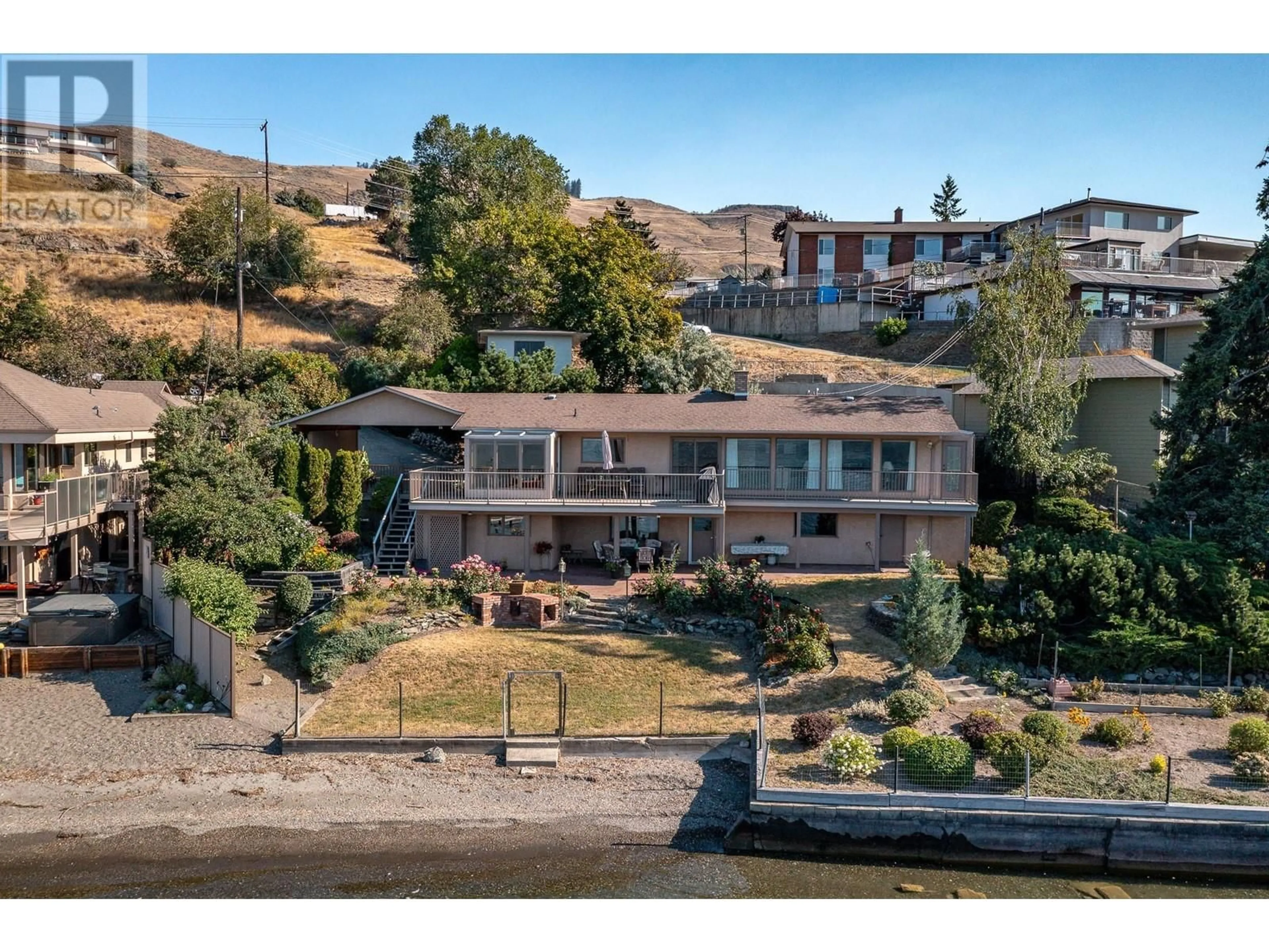 A pic from outside/outdoor area/front of a property/back of a property/a pic from drone, water/lake/river/ocean view for 7444 OLD STAMP MILL ROAD, Vernon British Columbia V2H1C3