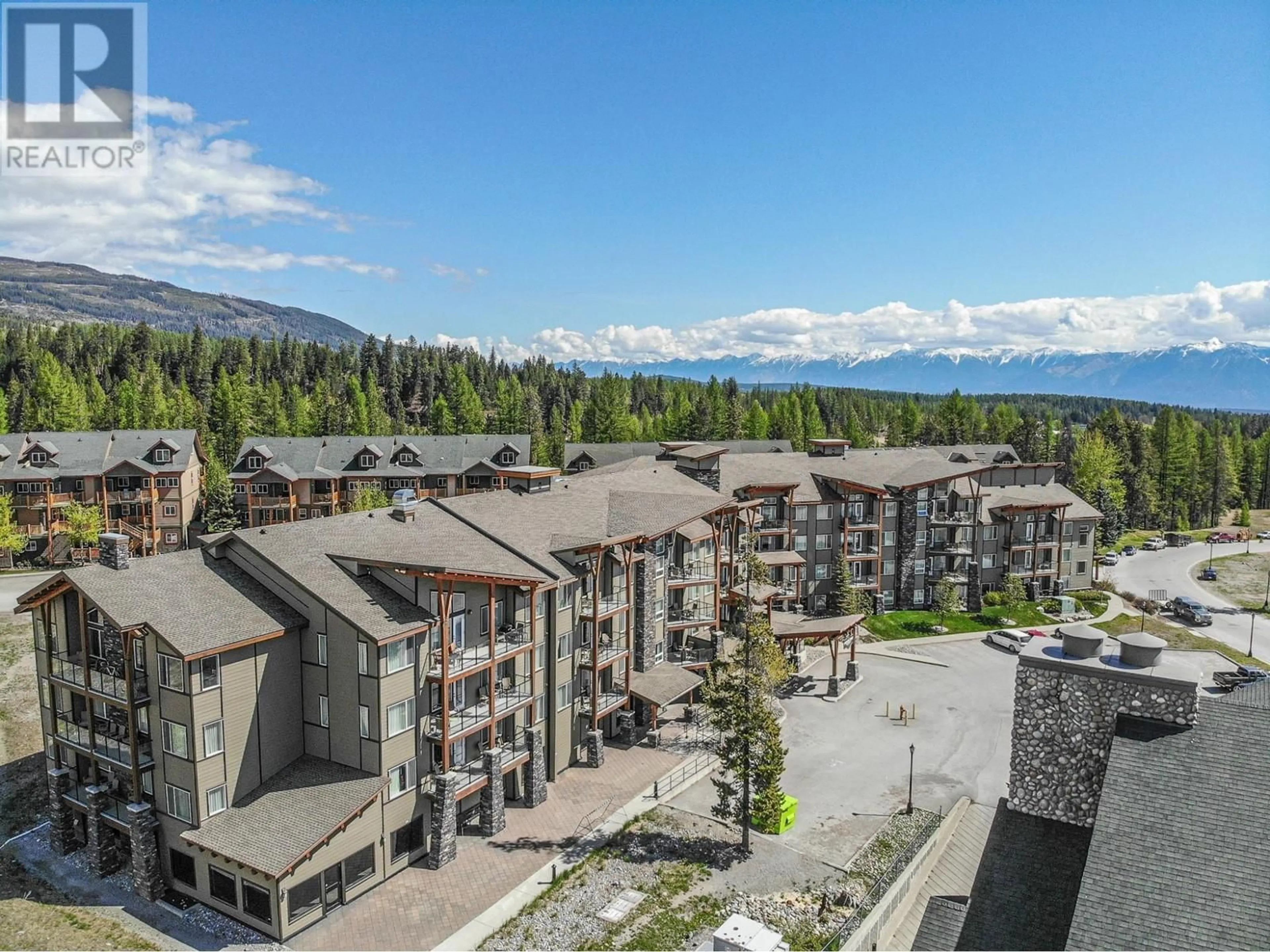 A pic from outside/outdoor area/front of a property/back of a property/a pic from drone, mountain view for 400 STEMWINDER Drive Unit# 310, Kimberley British Columbia V1A2Y9