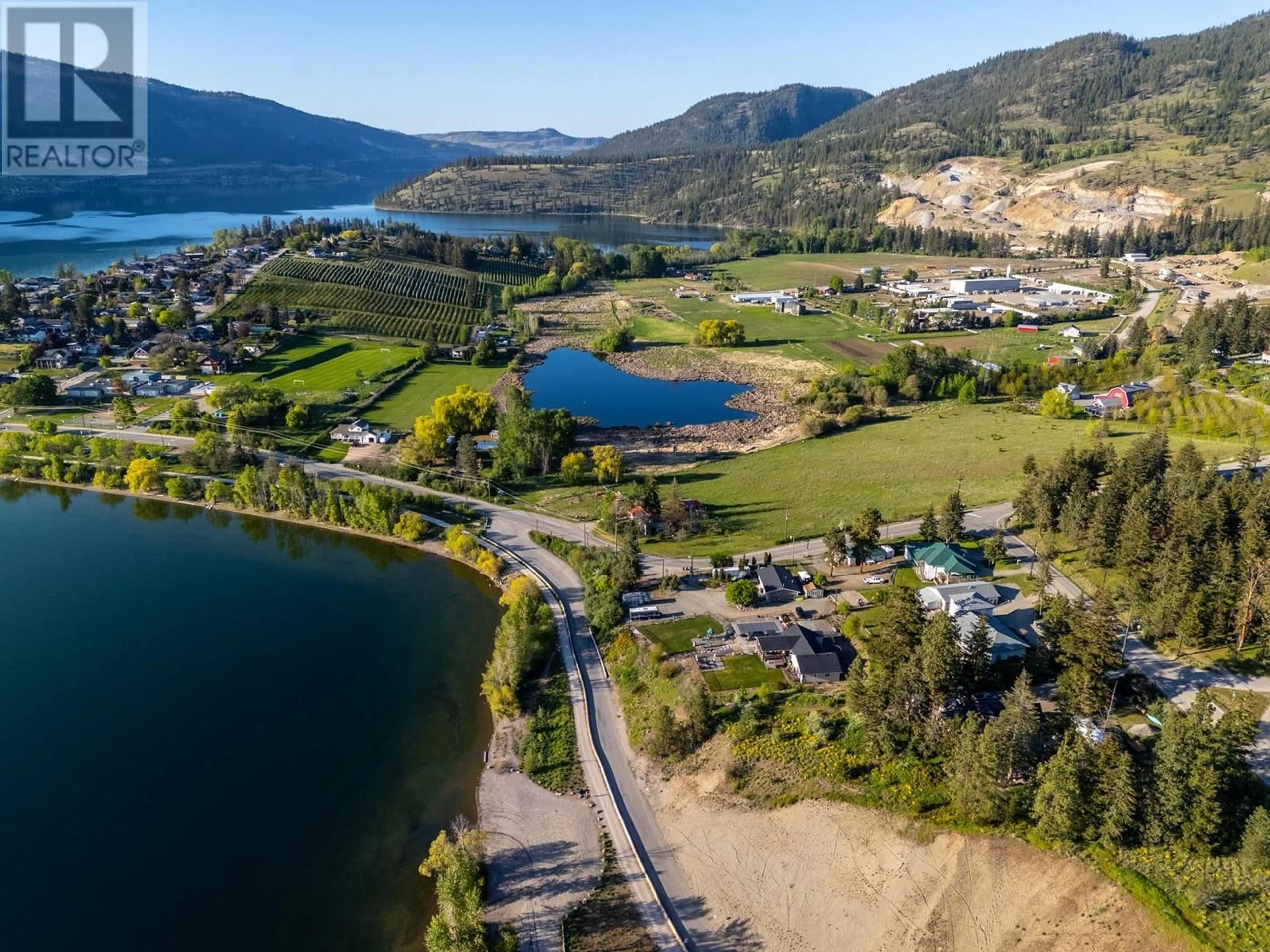 A pic from outside/outdoor area/front of a property/back of a property/a pic from drone, water/lake/river/ocean view for 15326 OYAMA ROAD, Lake Country British Columbia V4V2C5