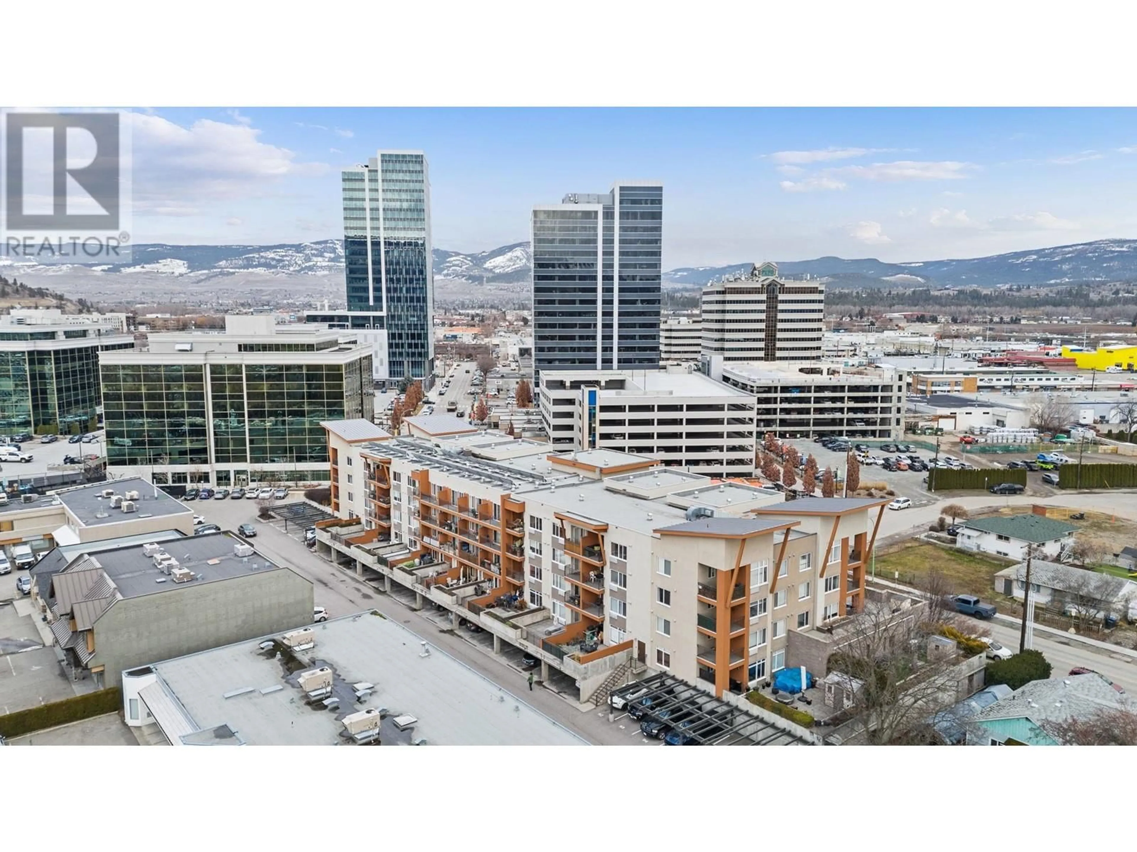 A pic from outside/outdoor area/front of a property/back of a property/a pic from drone, city buildings view from balcony for 1550 Dickson Avenue Unit# 412, Kelowna British Columbia V1Y9Y8