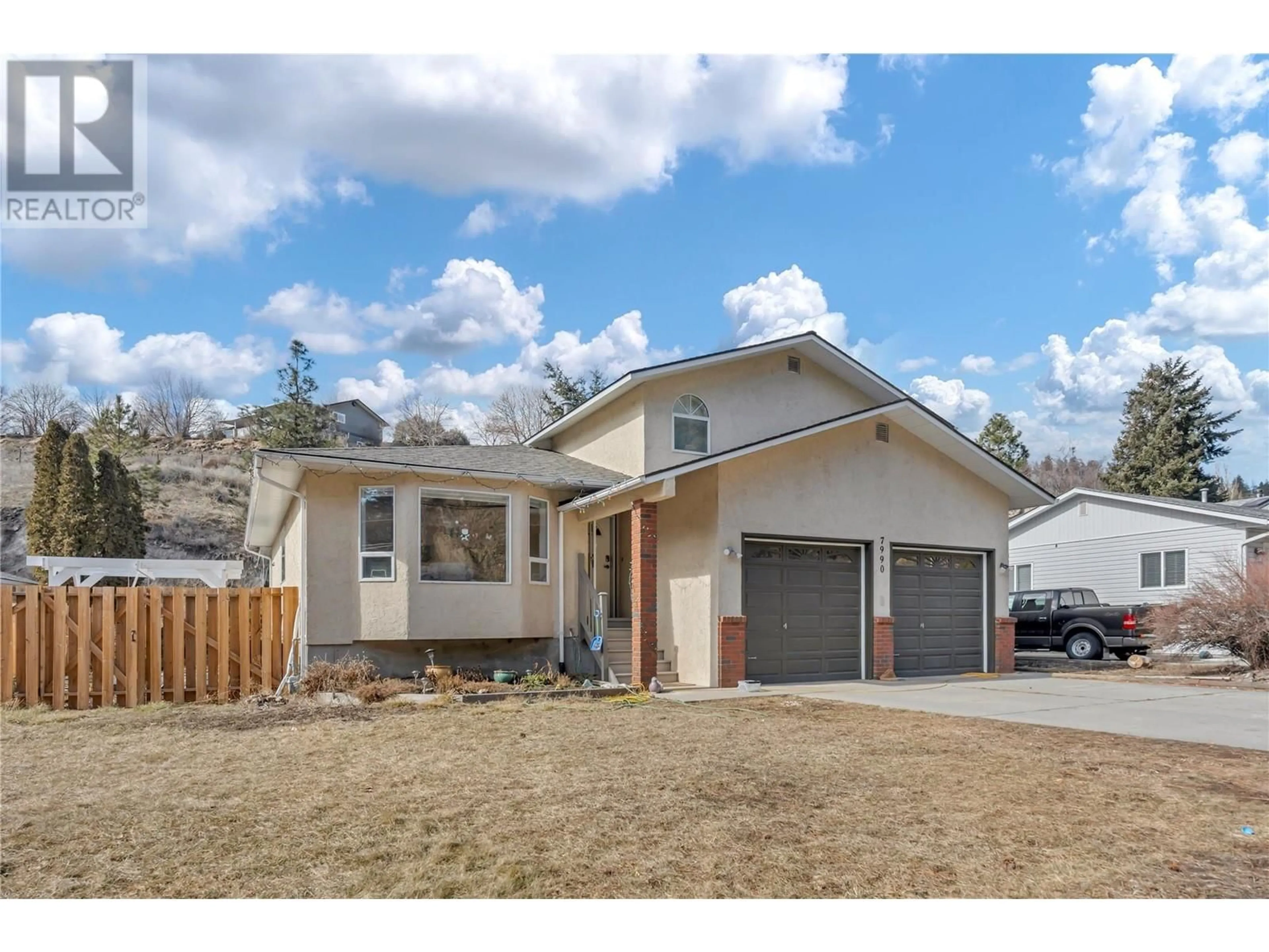 Home with vinyl exterior material, street for 7990 VICTORIA ROAD SOUTH, Summerland British Columbia V0H1Z2