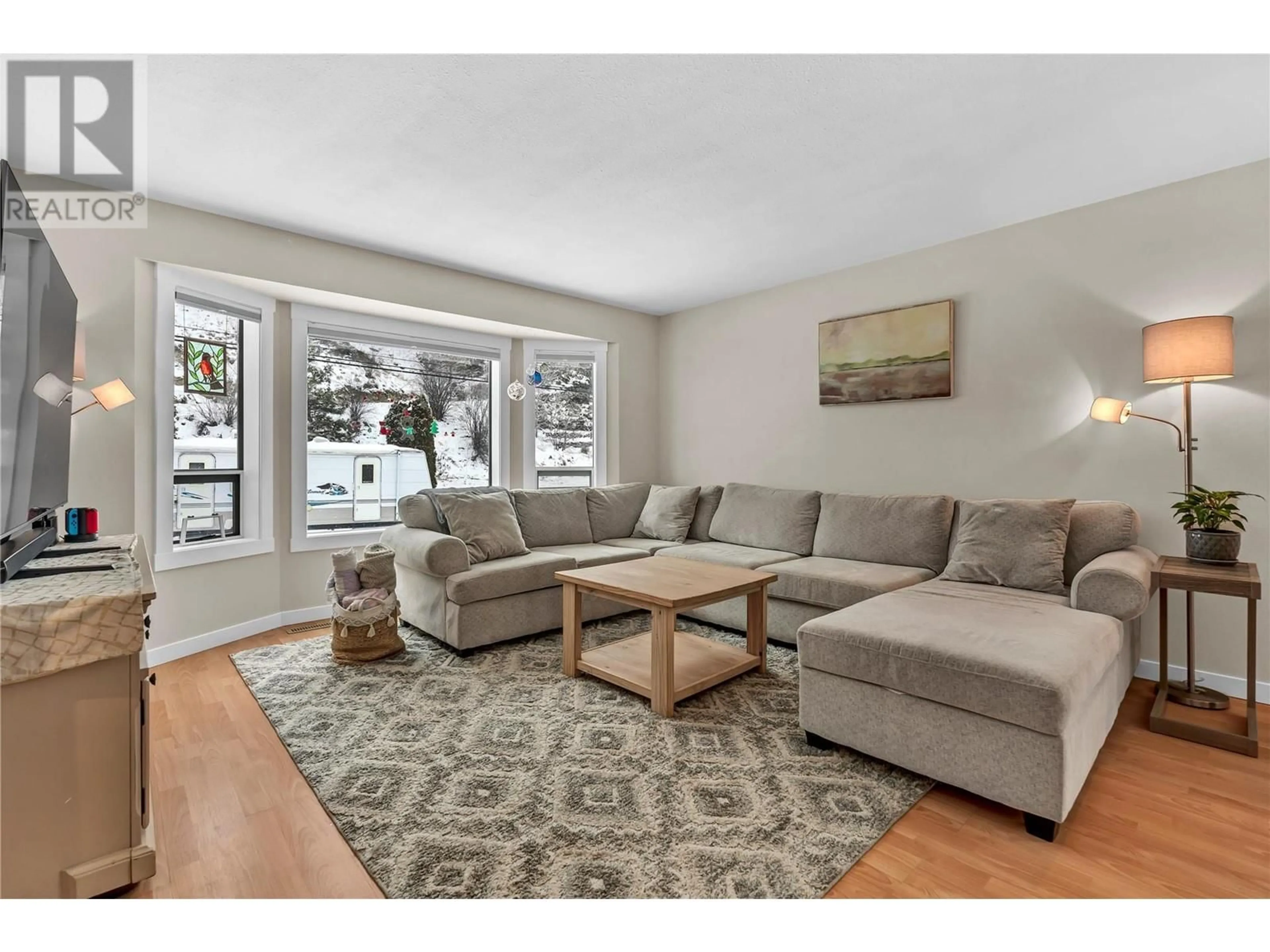 Living room with furniture, unknown for 7990 VICTORIA ROAD SOUTH, Summerland British Columbia V0H1Z2