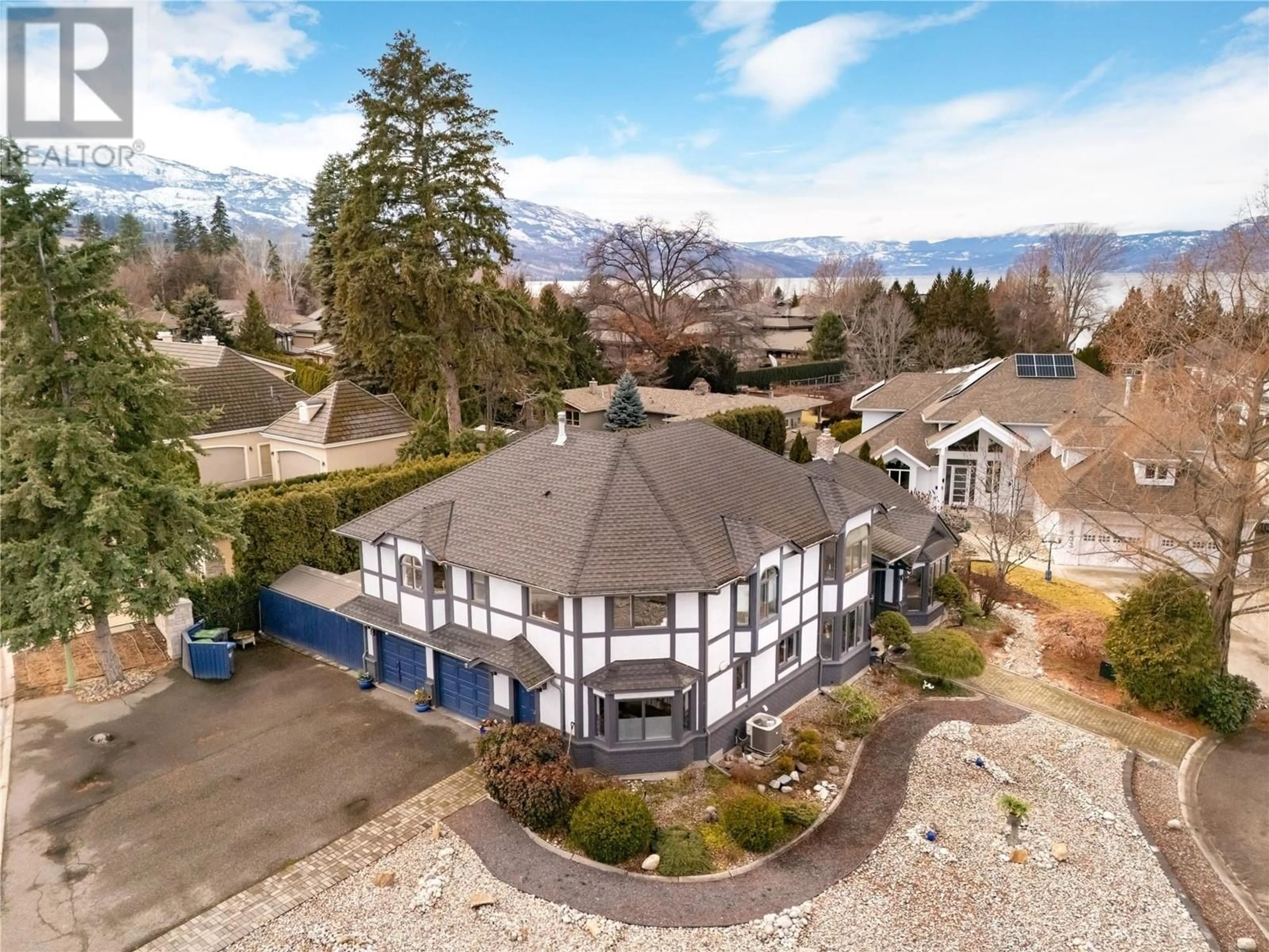 A pic from outside/outdoor area/front of a property/back of a property/a pic from drone, mountain view for 437 Duke Court, Kelowna British Columbia V1W3A2