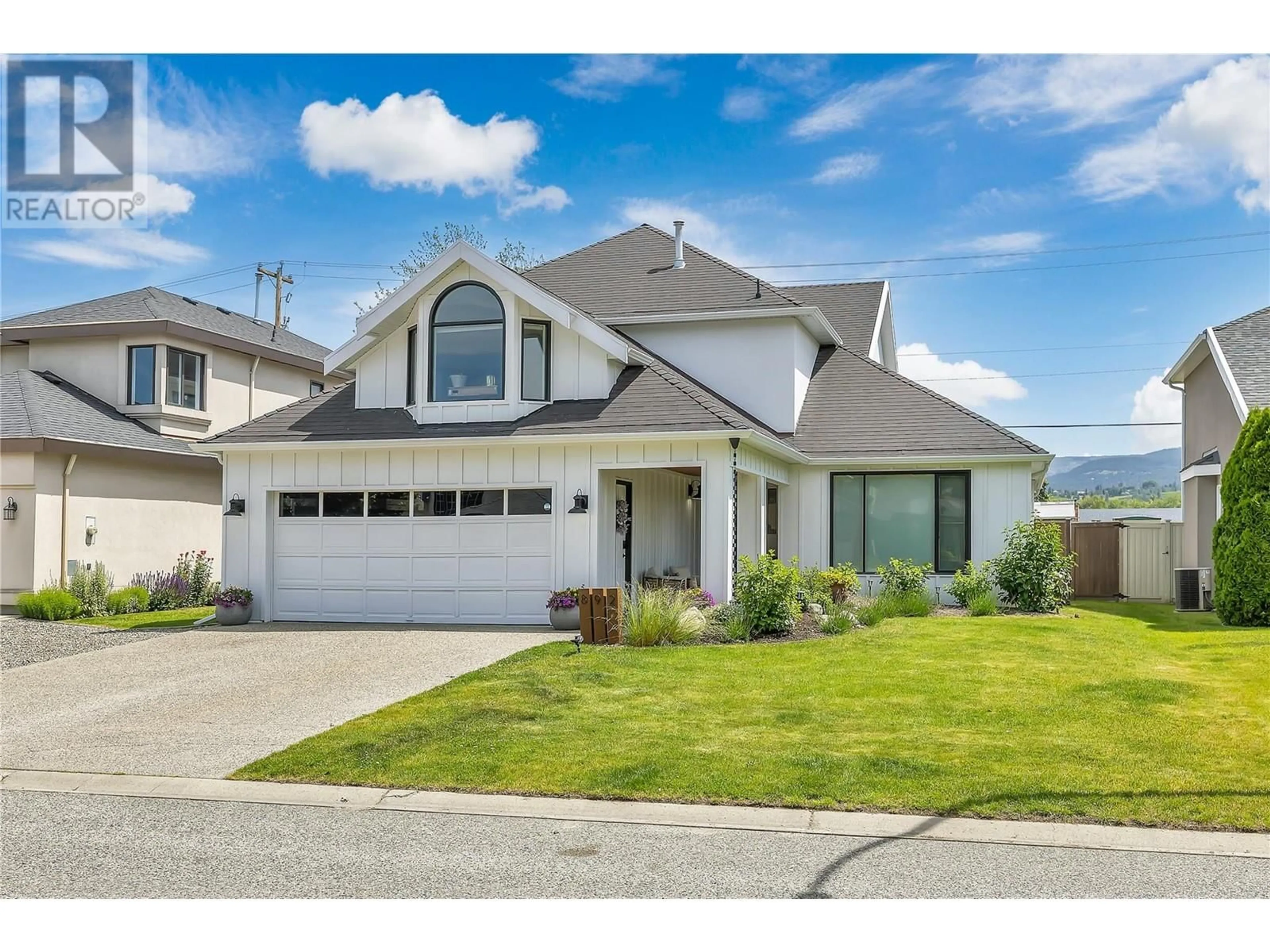 Home with vinyl exterior material, unknown for 892 MISSION SPRINGS CRESCENT, Kelowna British Columbia V1W3L9