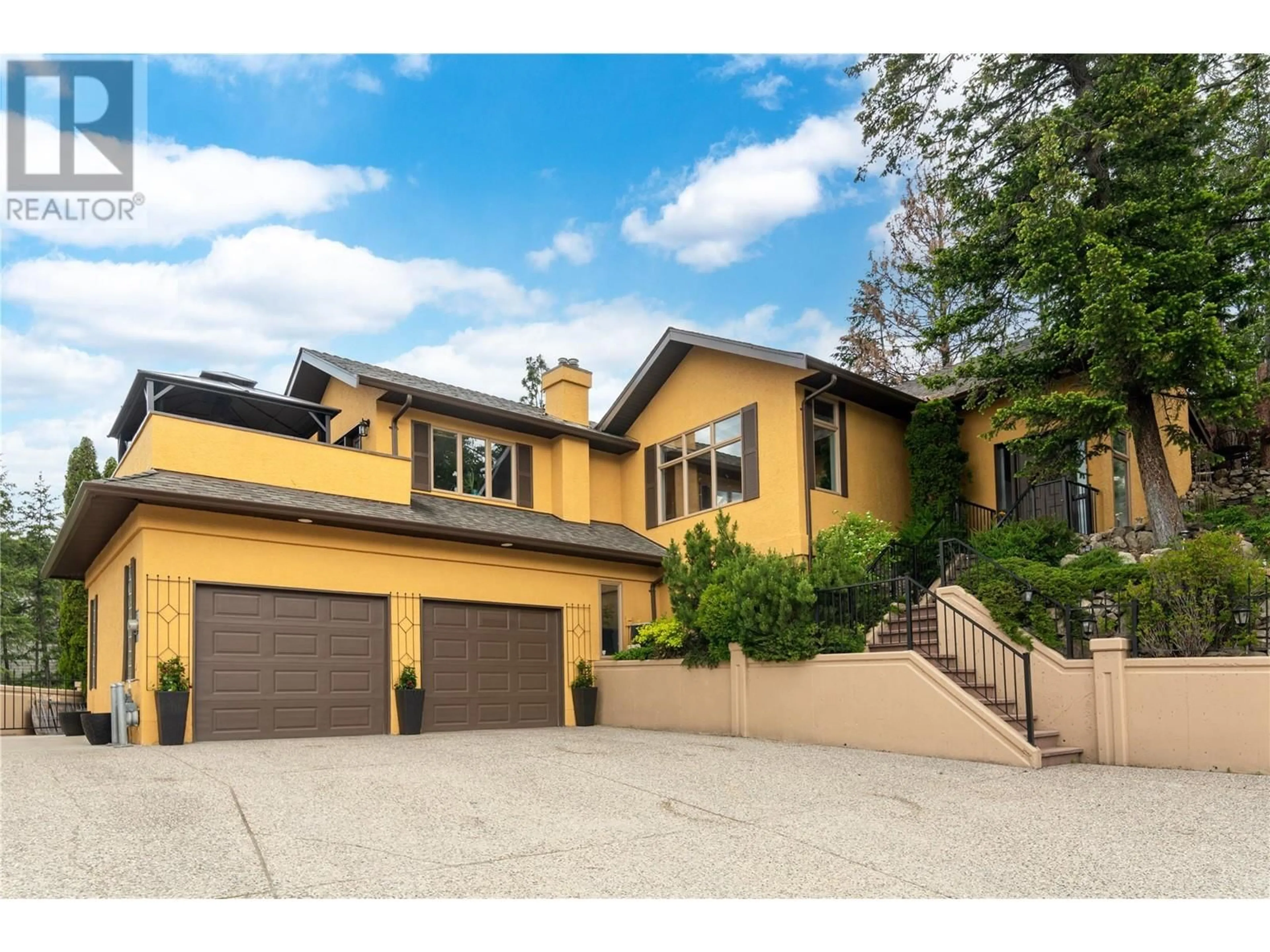 Home with brick exterior material, street for 2325 LILLOOET CRESCENT, Kelowna British Columbia V1V1T1
