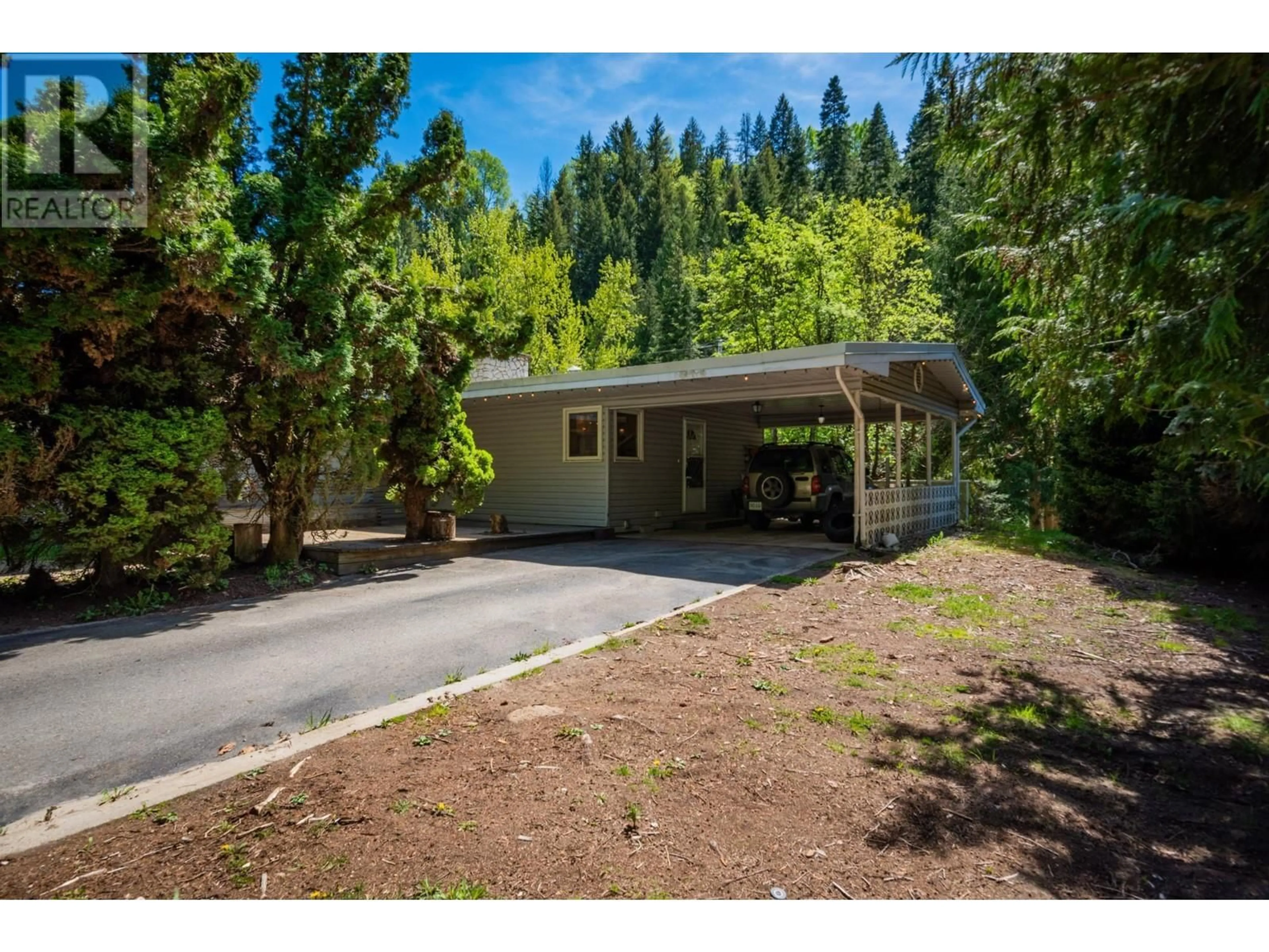 A pic from outside/outdoor area/front of a property/back of a property/a pic from drone, forest/trees view for 3650 PLACE Road, Crescent Valley British Columbia V0G1H0