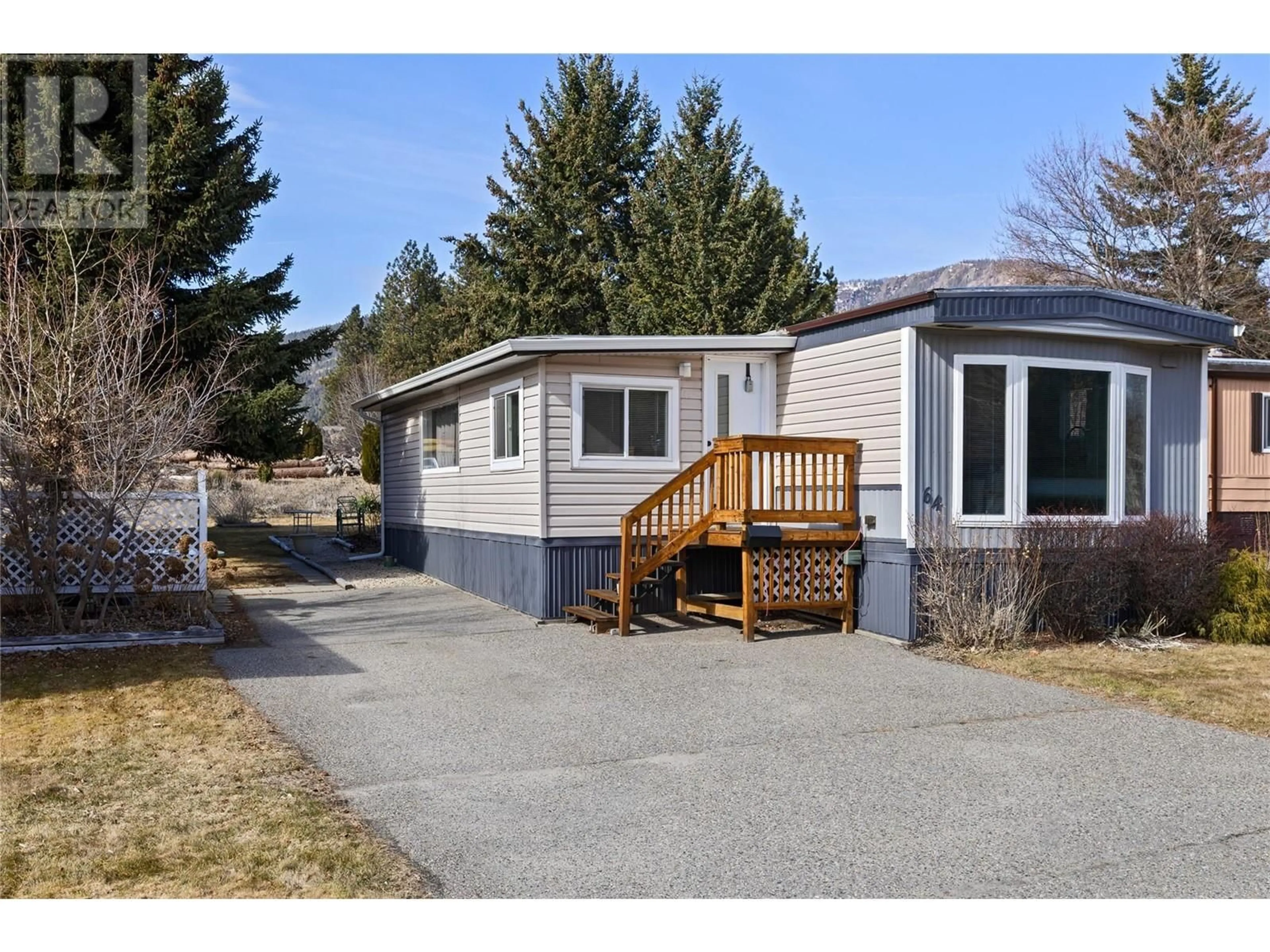 Home with vinyl exterior material, street for 64 - 1929 97 HIGHWAY SOUTH, West Kelowna British Columbia V1Z2Z1