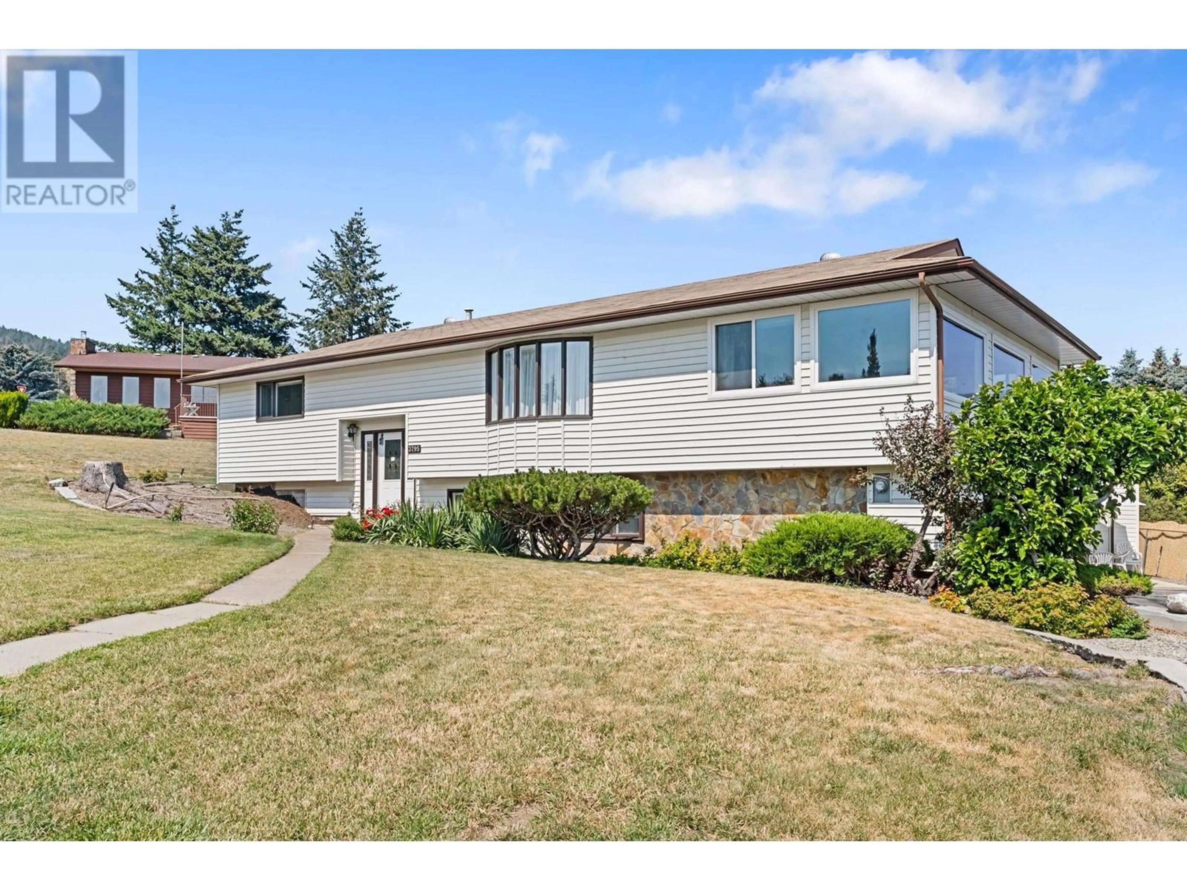 Home with vinyl exterior material, street for 3795 SALLOUM ROAD, West Kelowna British Columbia V4T1E2