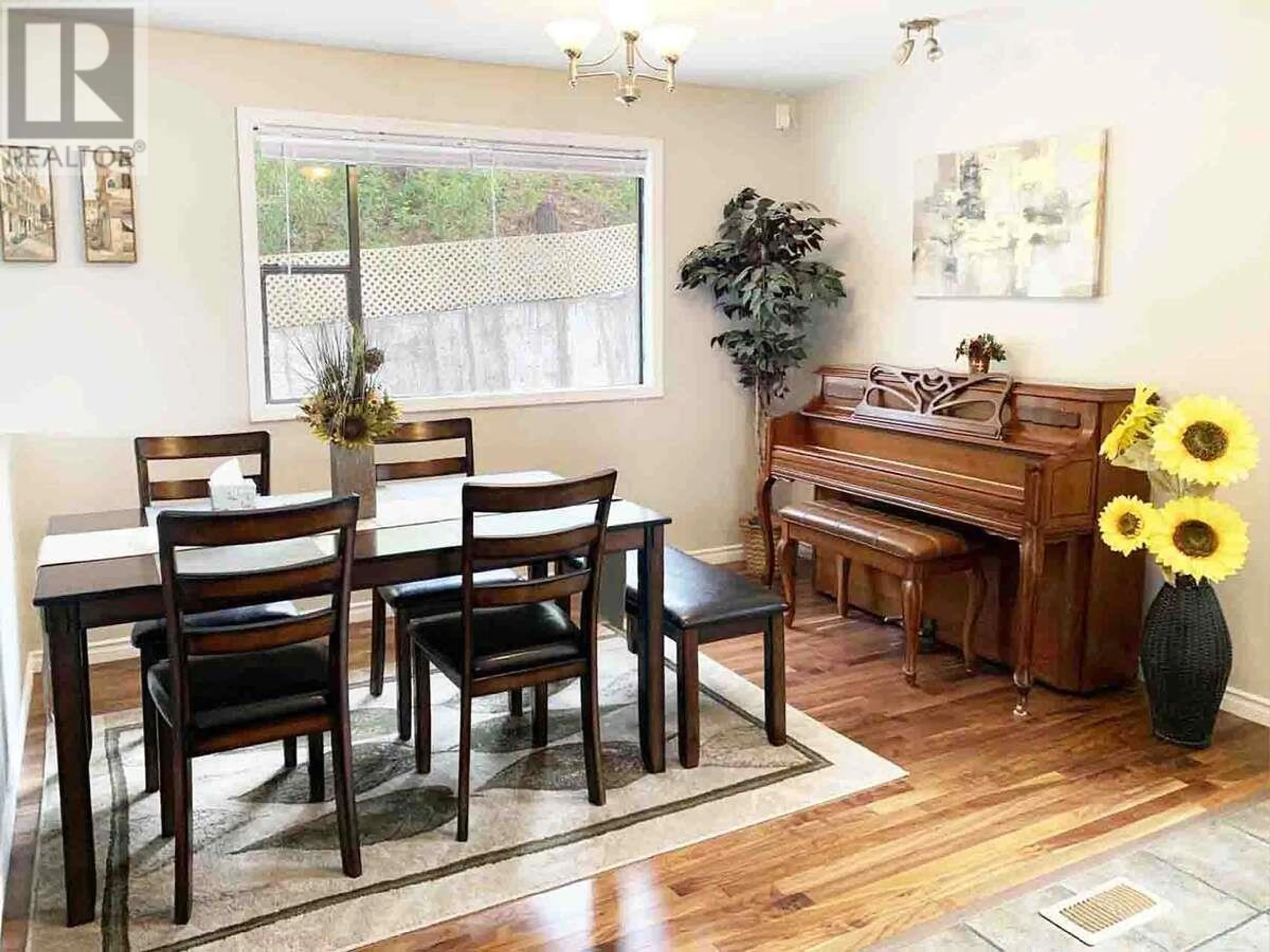 Dining room, wood/laminate floor for 5821 Atkinson Crescent, Peachland British Columbia V0H1X4