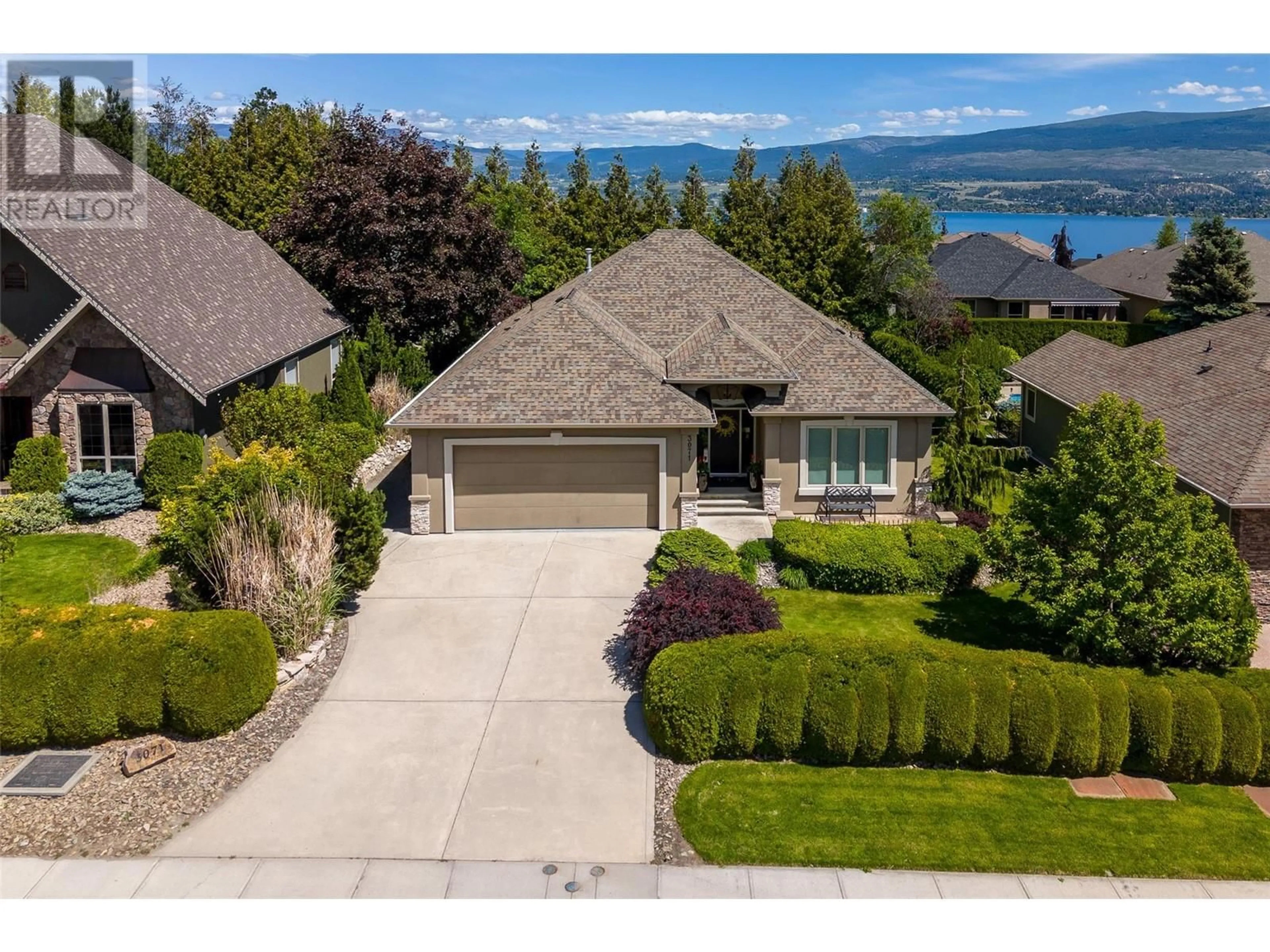 A pic from outside/outdoor area/front of a property/back of a property/a pic from drone, water/lake/river/ocean view for 3071 Thacker Drive, West Kelowna British Columbia V1Z1X5