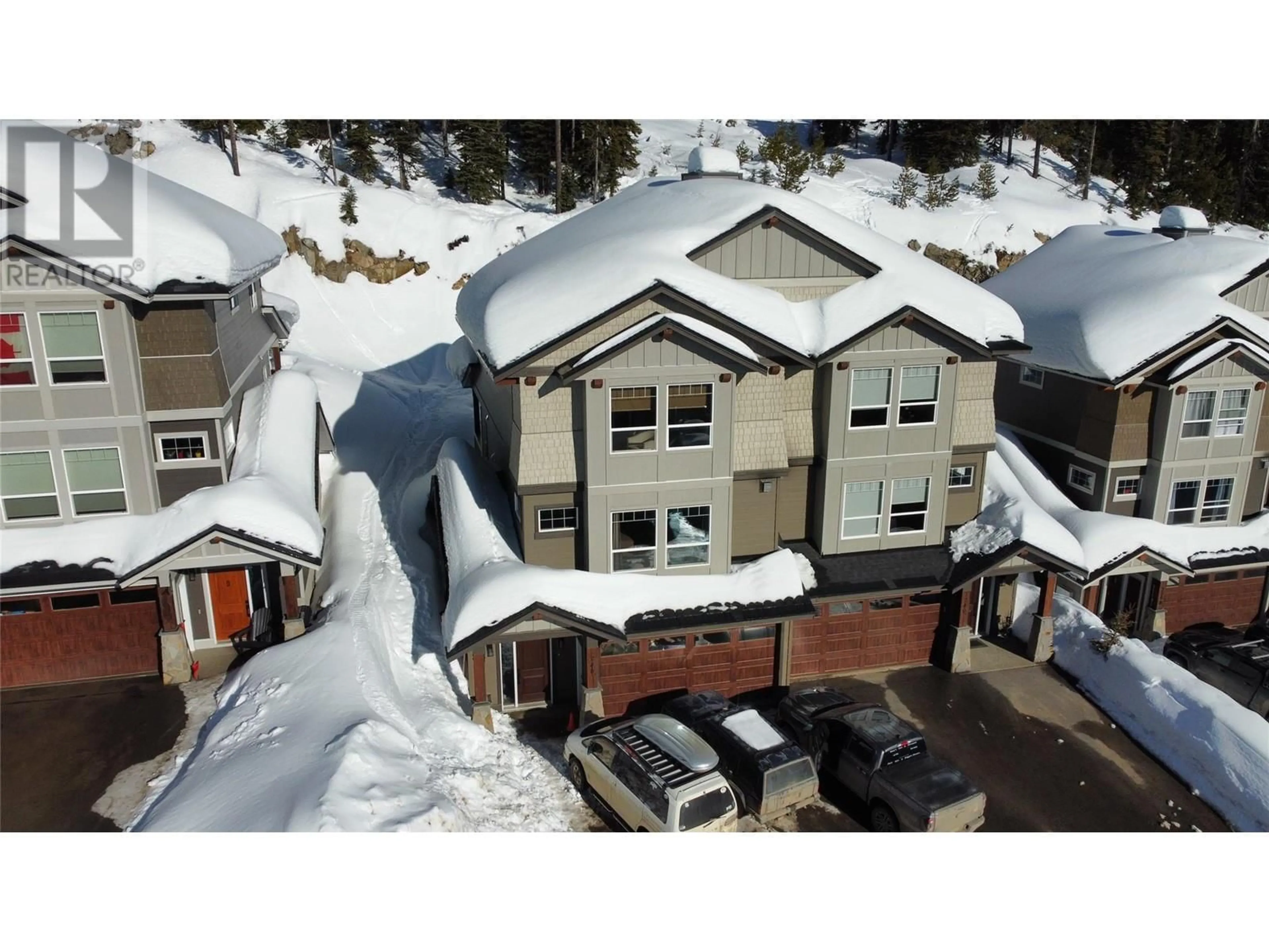 A pic from outside/outdoor area/front of a property/back of a property/a pic from drone, mountain view for 240B GRIZZLY RIDGE TRAIL, Big White British Columbia V1P1P3