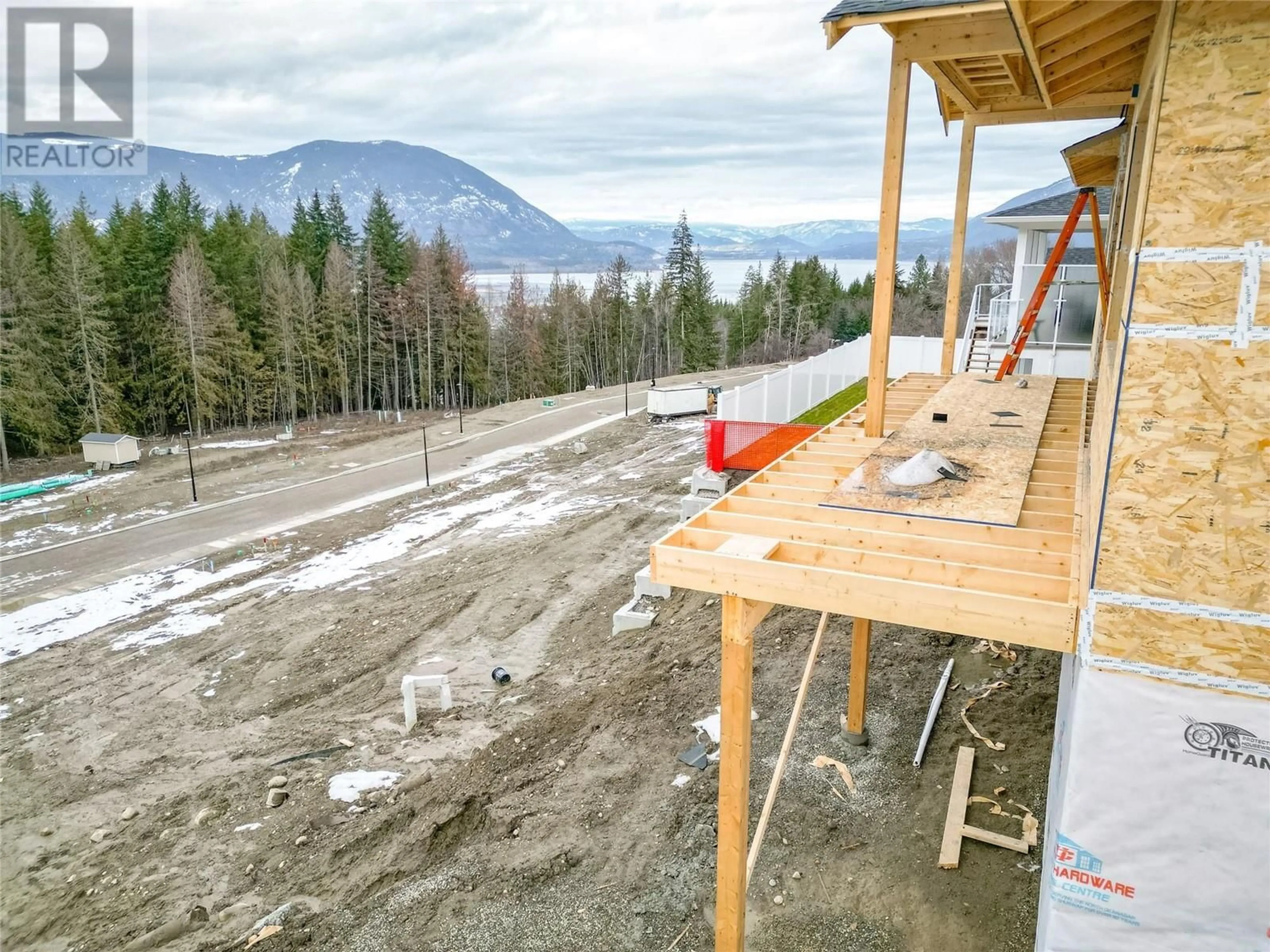 A pic from outside/outdoor area/front of a property/back of a property/a pic from drone, mountain view for 1681 9 STREET SOUTHEAST, Salmon Arm British Columbia V1E0G9