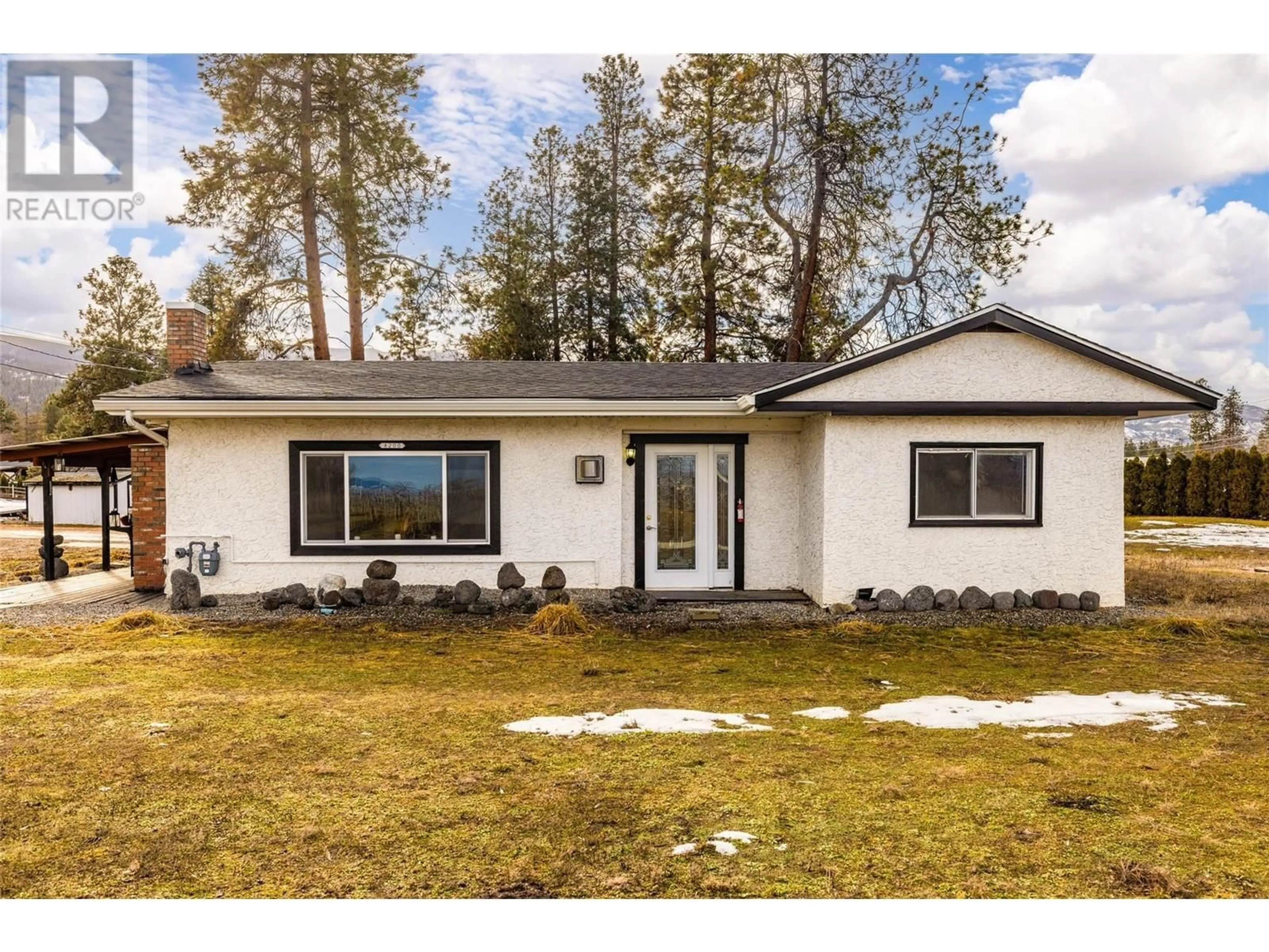 Home with vinyl exterior material, street for 4200 SPIERS ROAD, Kelowna British Columbia V1W4B5