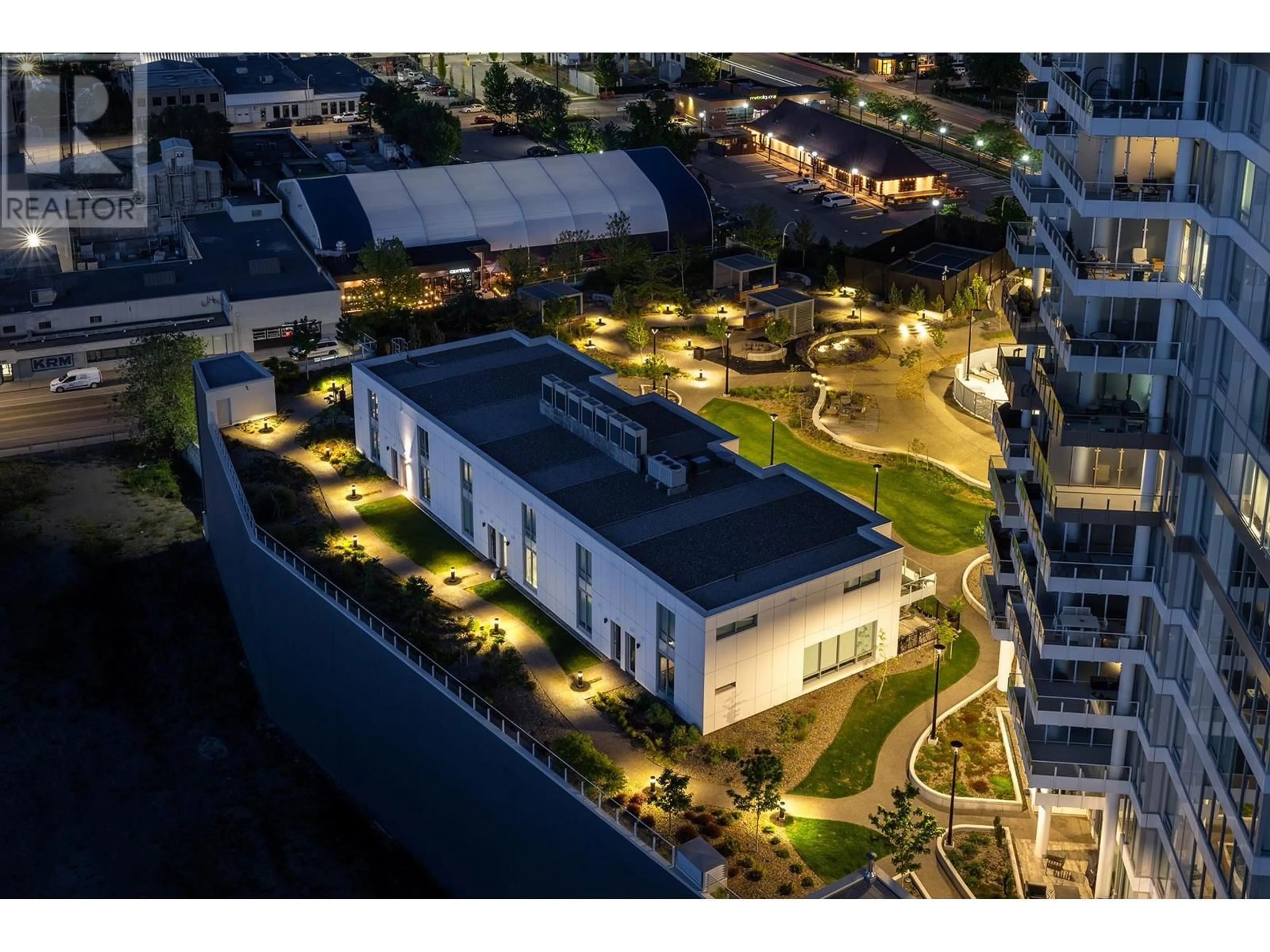 A pic from outside/outdoor area/front of a property/back of a property/a pic from drone, unknown for 411 - 1181 SUNSET DRIVE, Kelowna British Columbia V1Y0L4