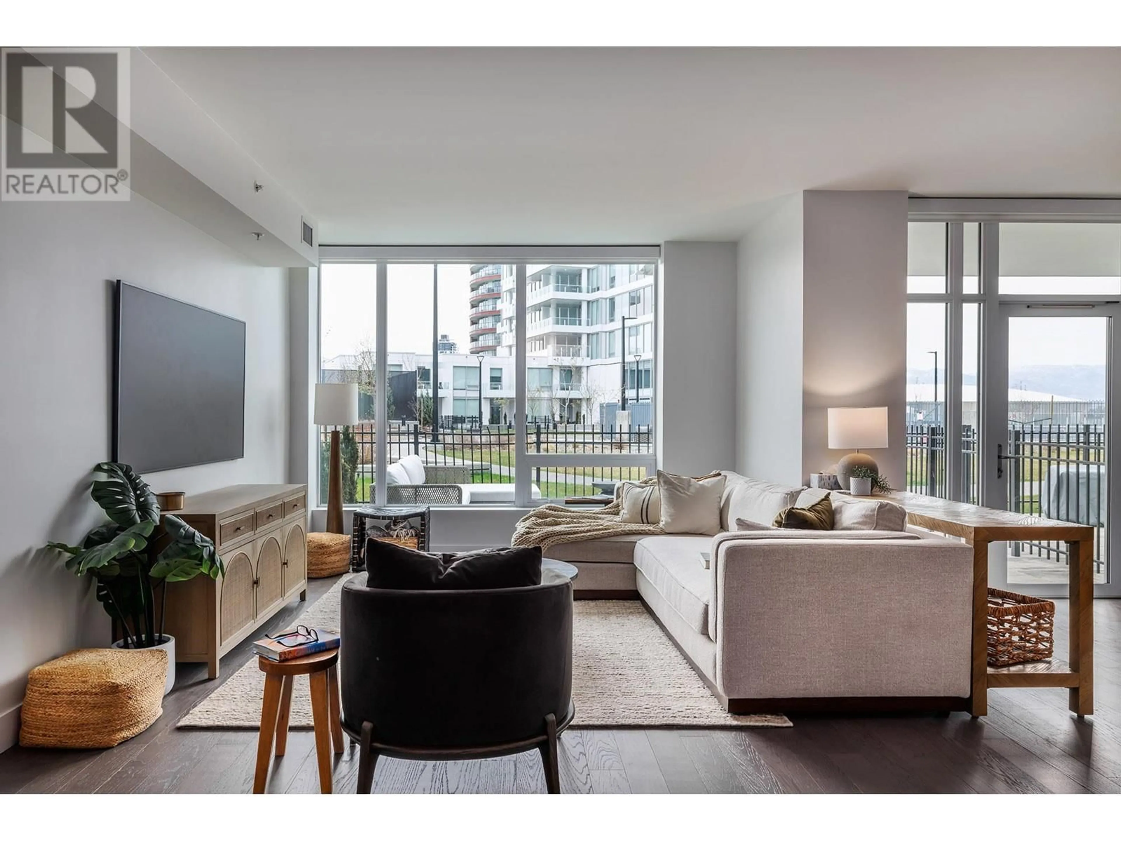 Living room with furniture, unknown for 411 - 1181 SUNSET DRIVE, Kelowna British Columbia V1Y0L4
