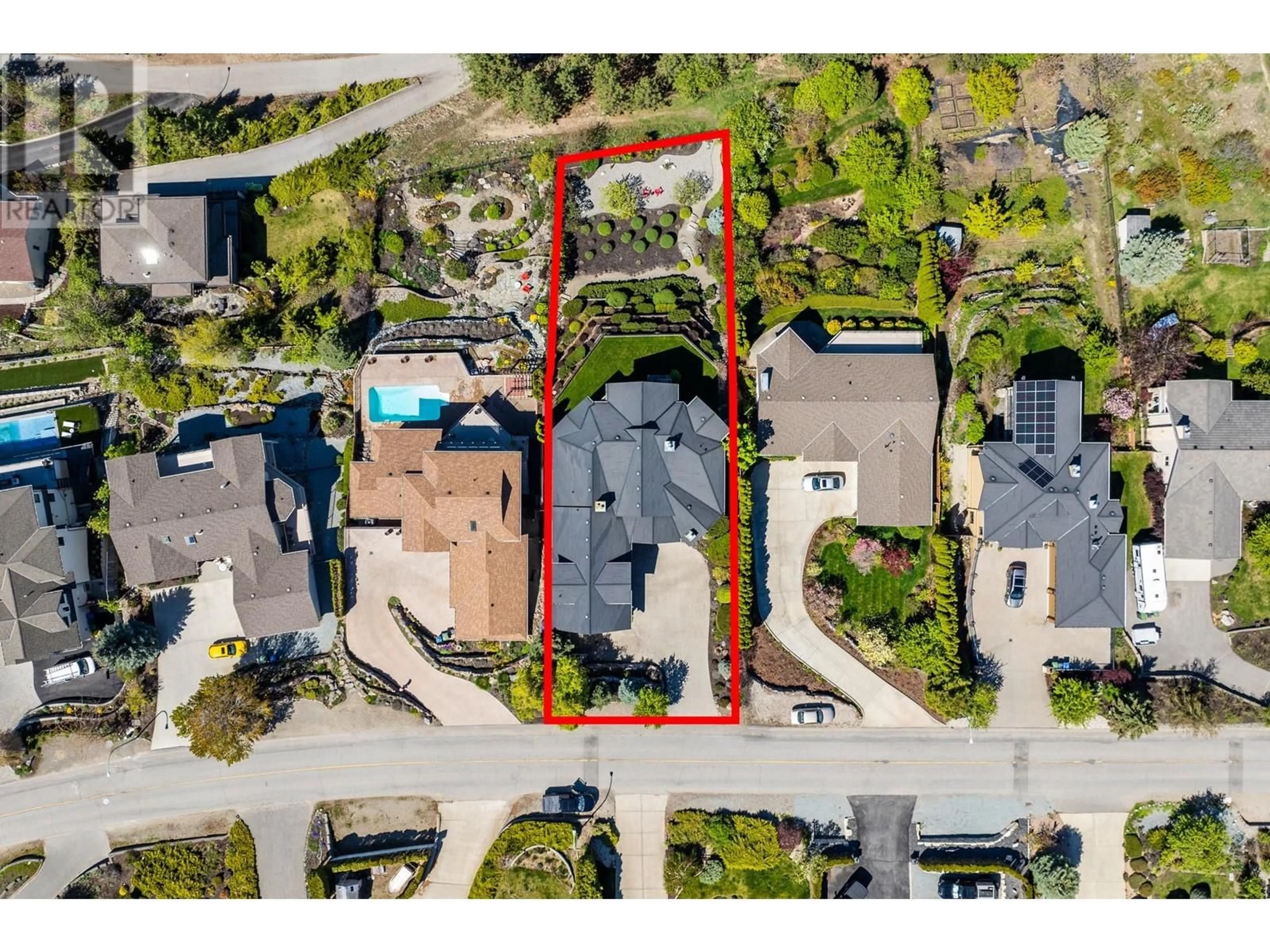 A pic from outside/outdoor area/front of a property/back of a property/a pic from drone, street for 414 OKAVIEW ROAD, Kelowna British Columbia V1W4K2