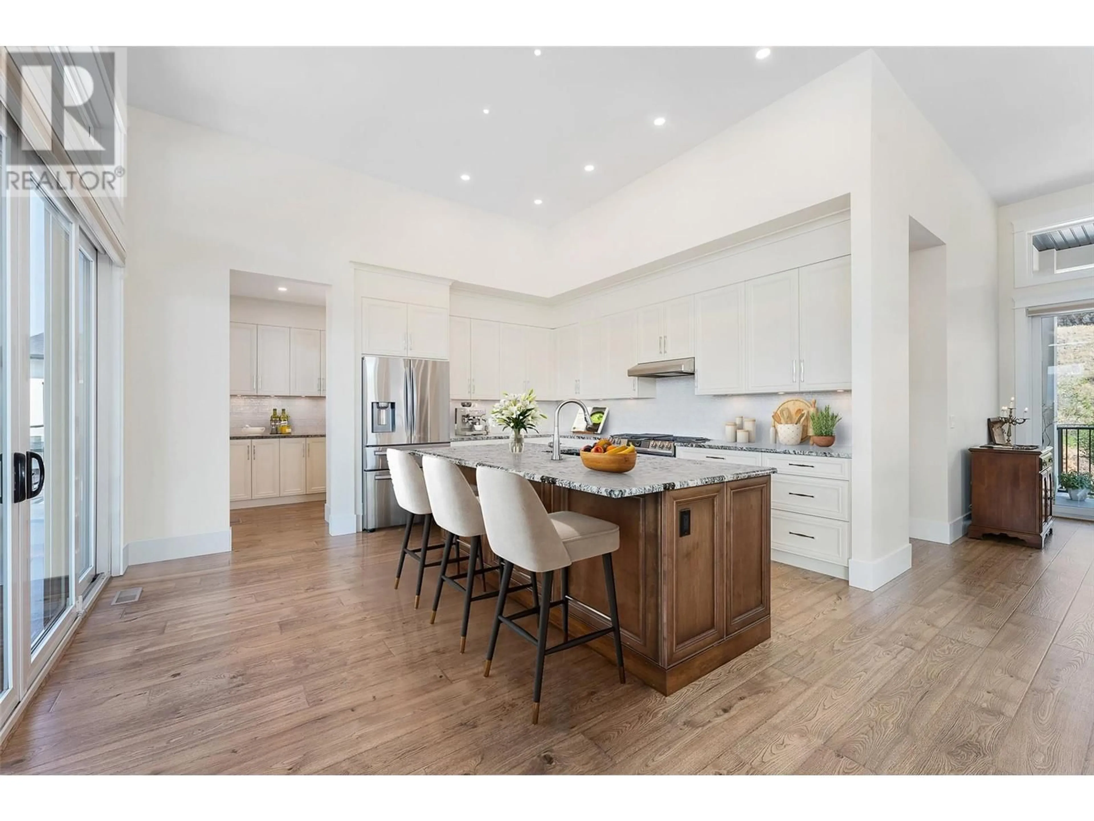 Open concept kitchen, wood/laminate floor for 1580 MALBEC PLACE, West Kelowna British Columbia V4T3B5