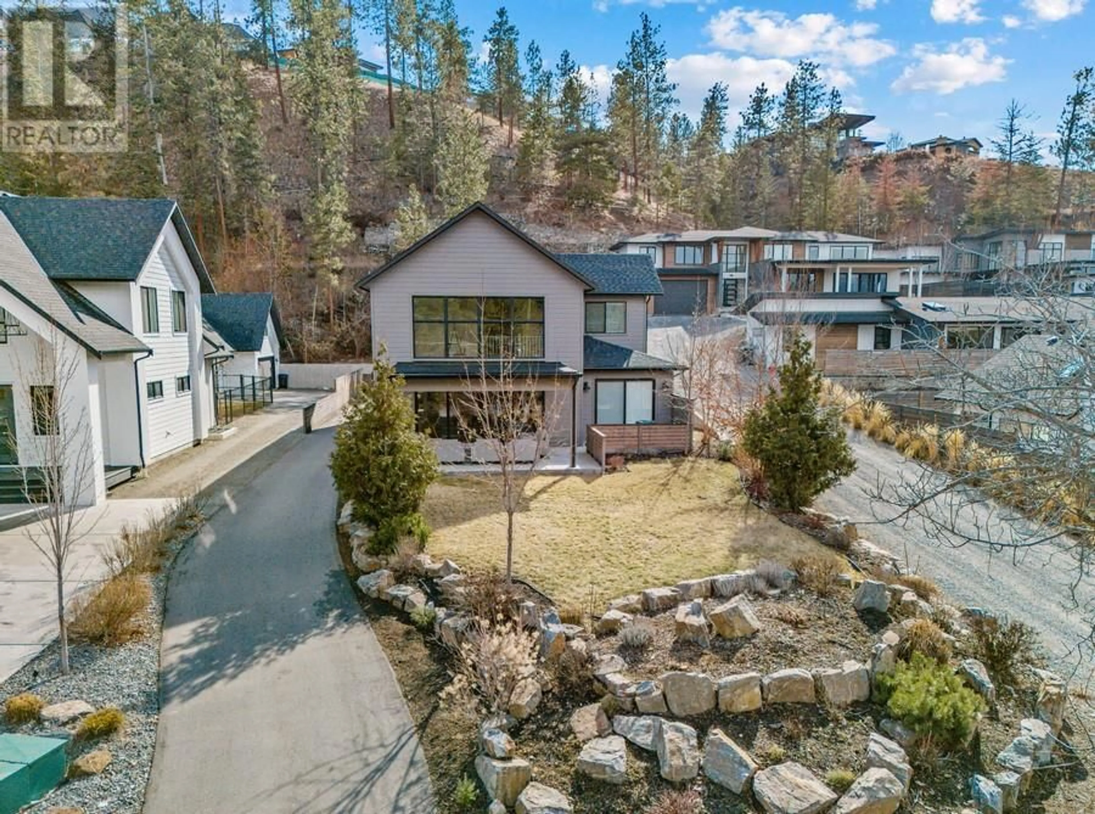 A pic from outside/outdoor area/front of a property/back of a property/a pic from drone, unknown for 773 BARNABY ROAD, Kelowna British Columbia V1W4N9